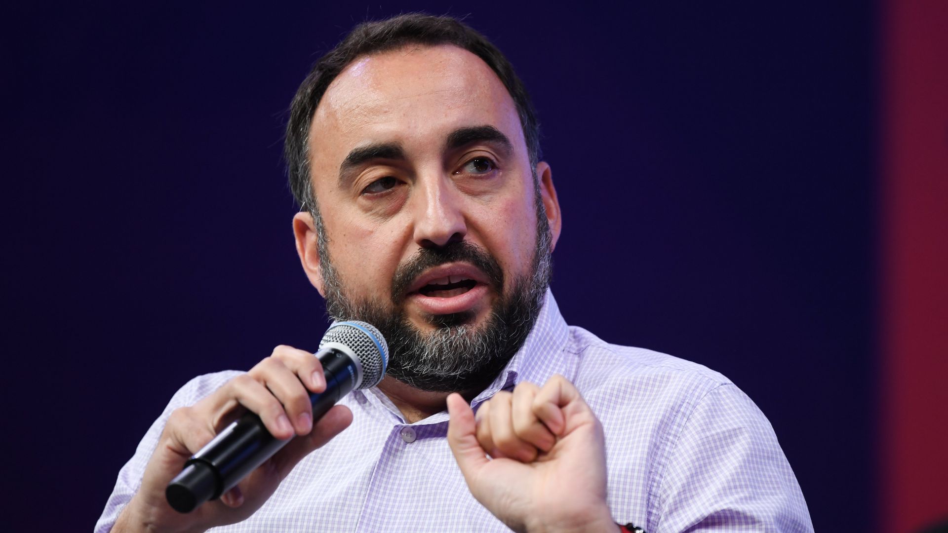 Alex Stamos talking into a microphone on Centre Stage at the Collision conference.
