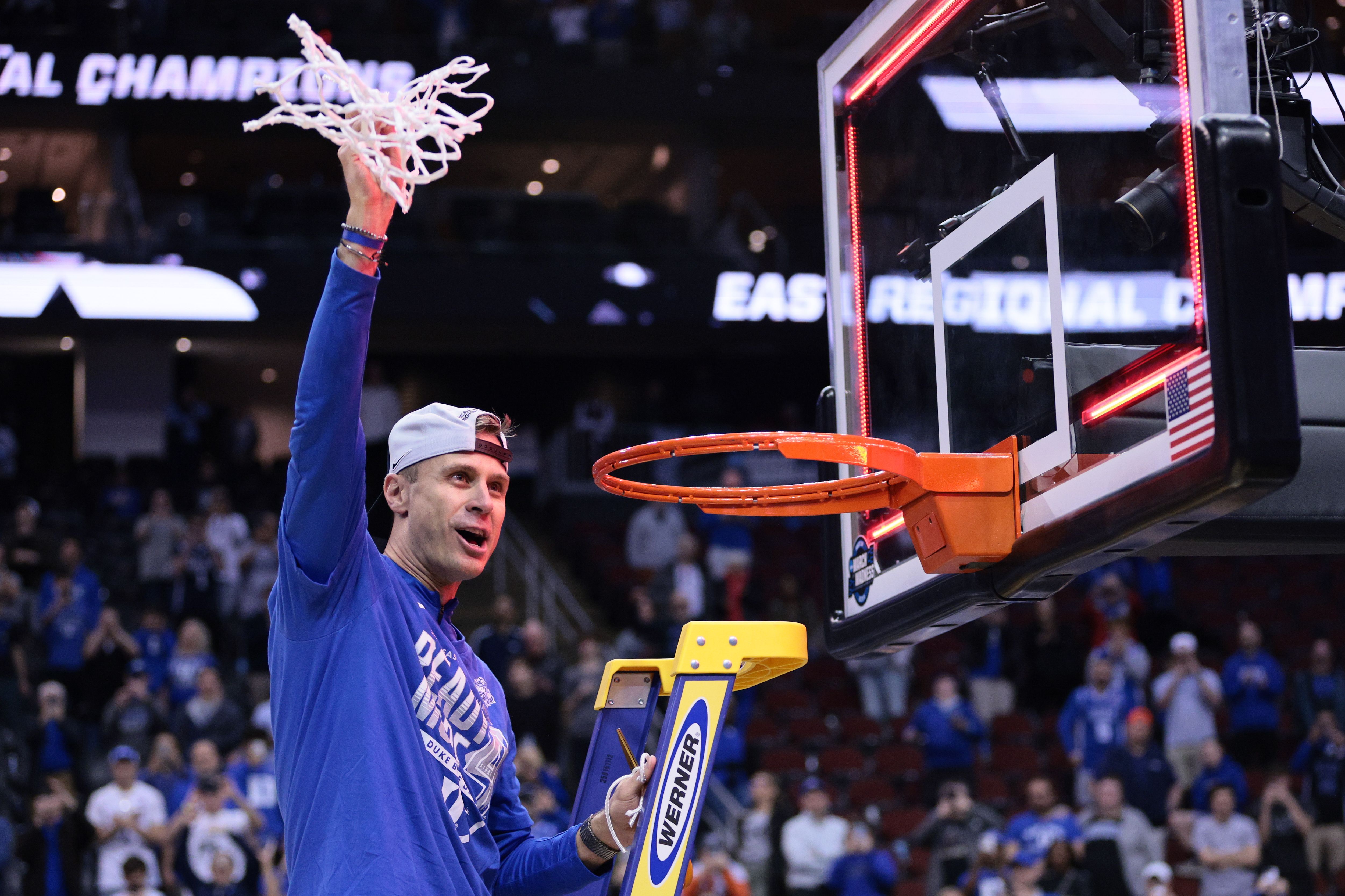 Coach cuts net