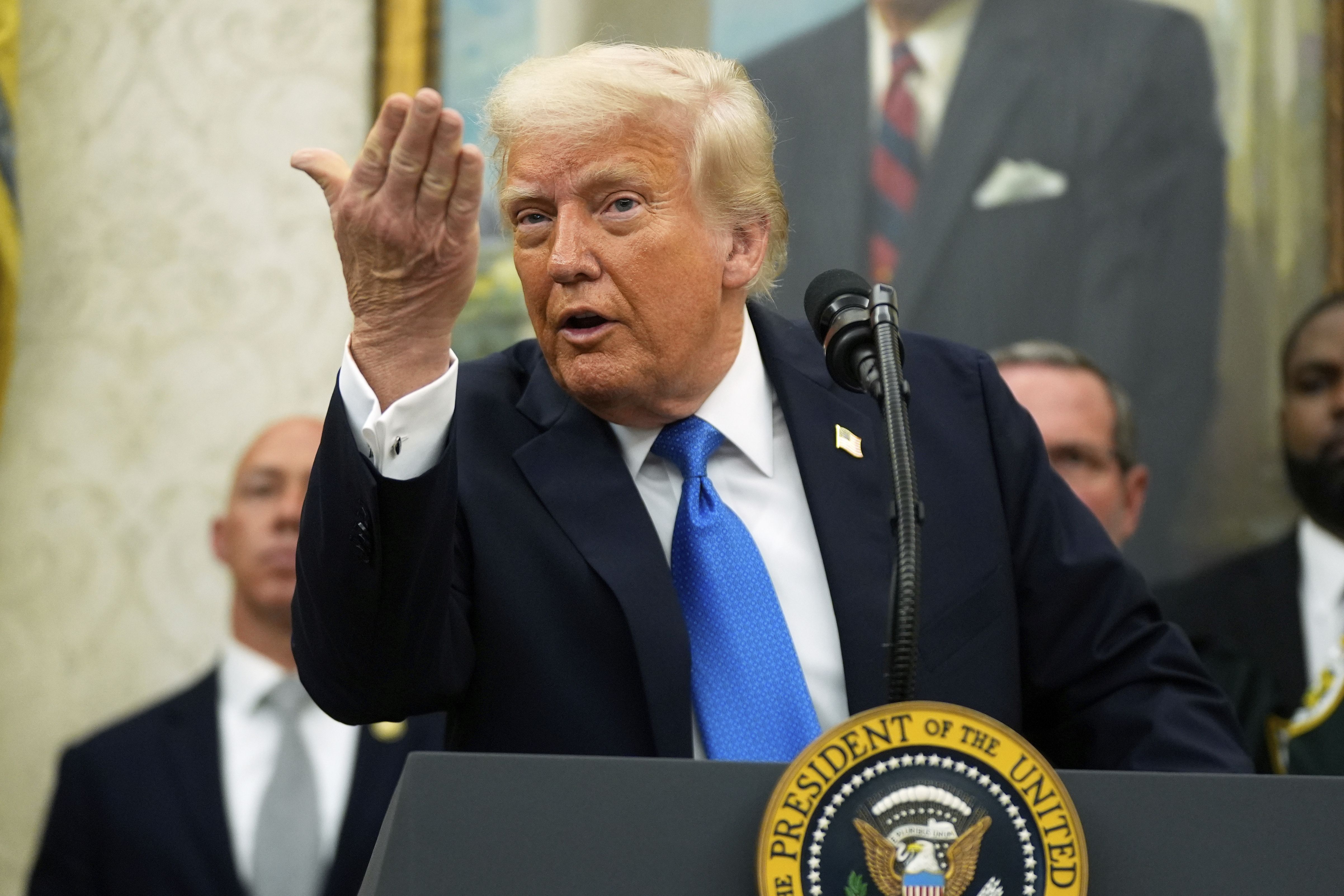 President Trump speaks during an award ceremony for law enforcement officers in the Oval Office yesterday.