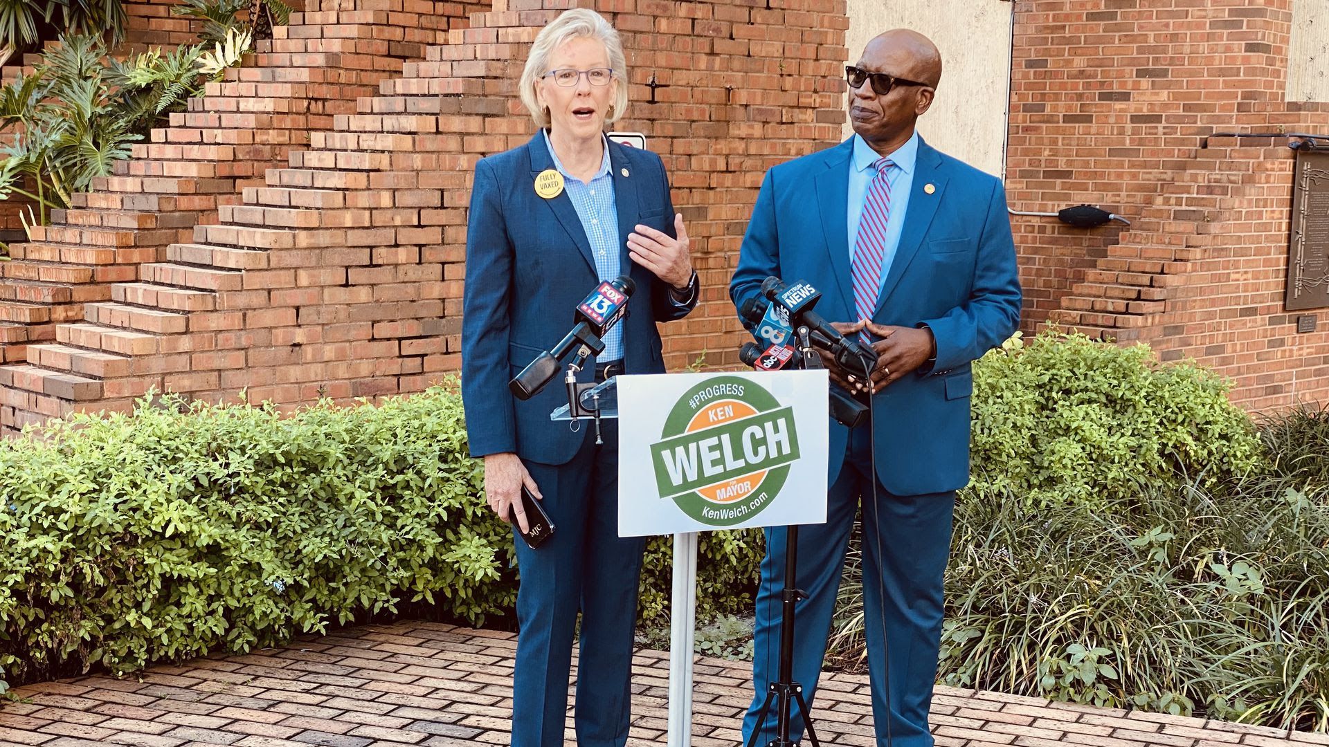 Tampa Mayor Jane Castor stands next to mayoral candidate Ken Welch outside in downtown Tampa.