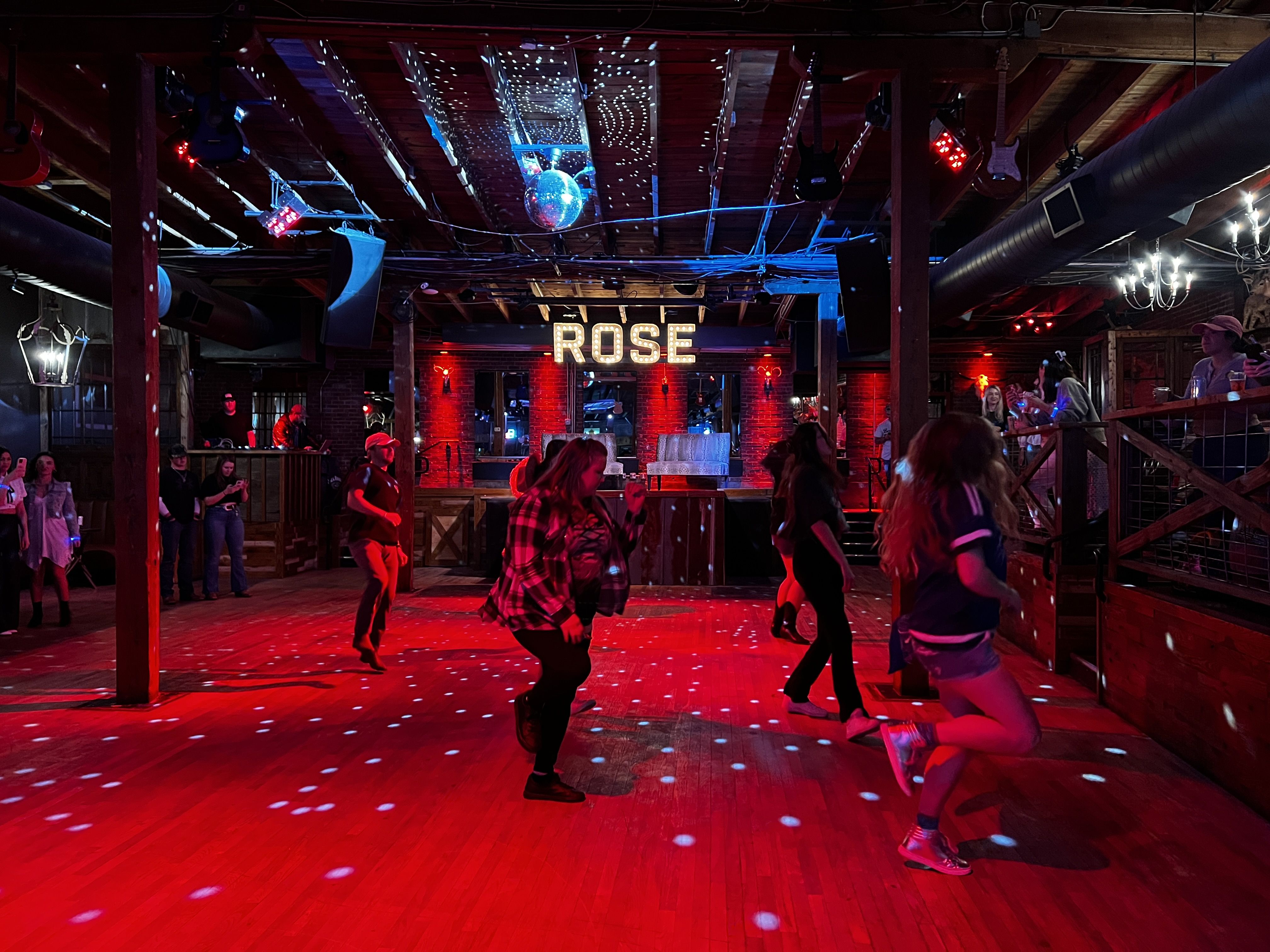 people dancing at a line dancing club