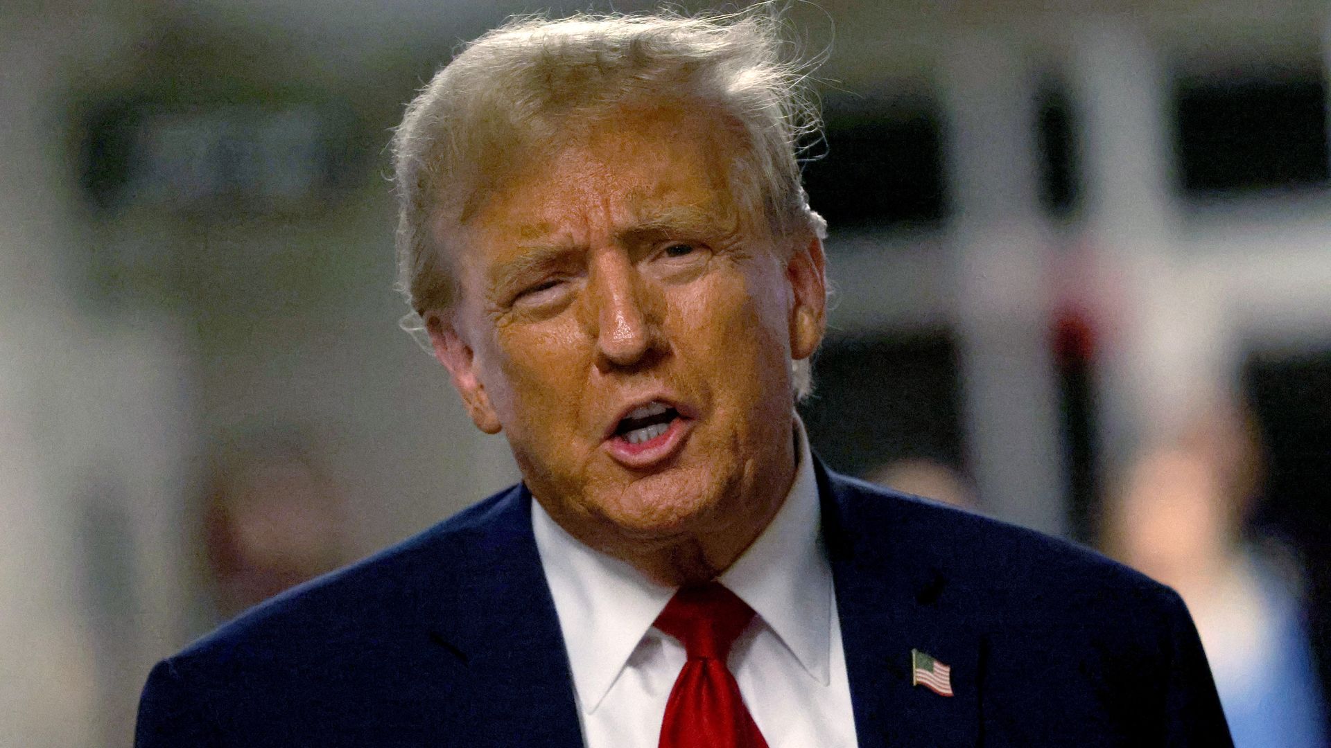 Donald Trump speaks to the media as he leaves court during his trial for allegedly covering up hush money payments at Manhattan Criminal Court on April 25