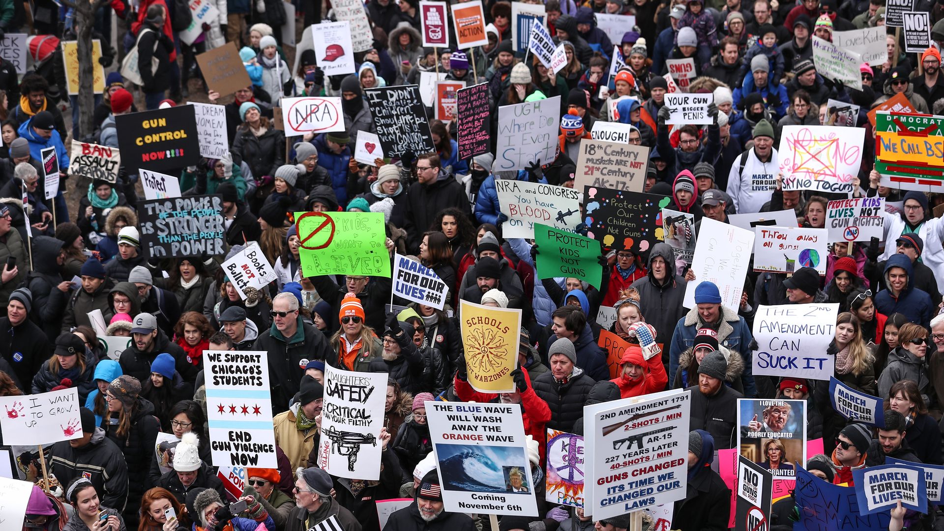 March for Our Lives rally with a crowd of people in the streets of Chicago