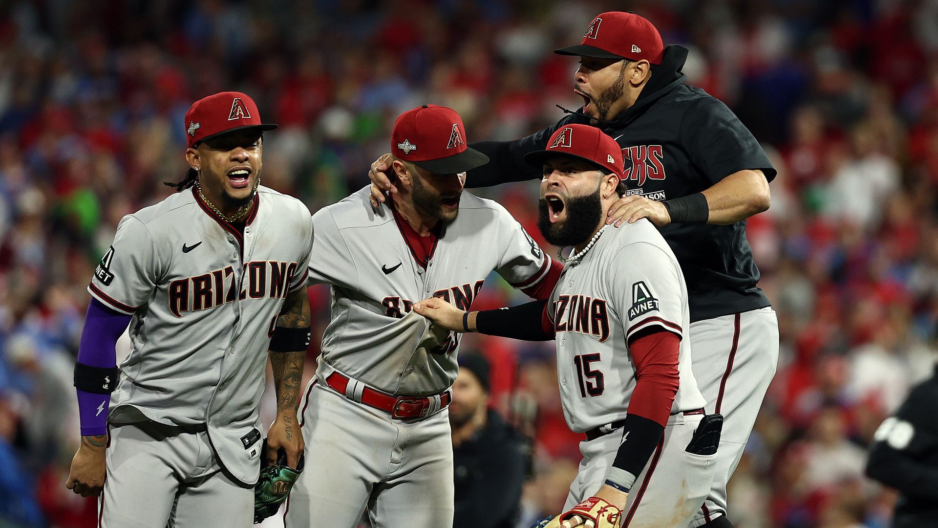 Ketel Marte #4, Emmanuel Rivera #15, Christian Walker #53 and Tommy Pham #28 of the Arizona Diamondbacks celebrate after beating the Philadelphia Phillies 4-2 in Game Seven of the Championship Series at Citizens Bank Park on October 24, 2023 in Philadelphia, Pennsylvania.