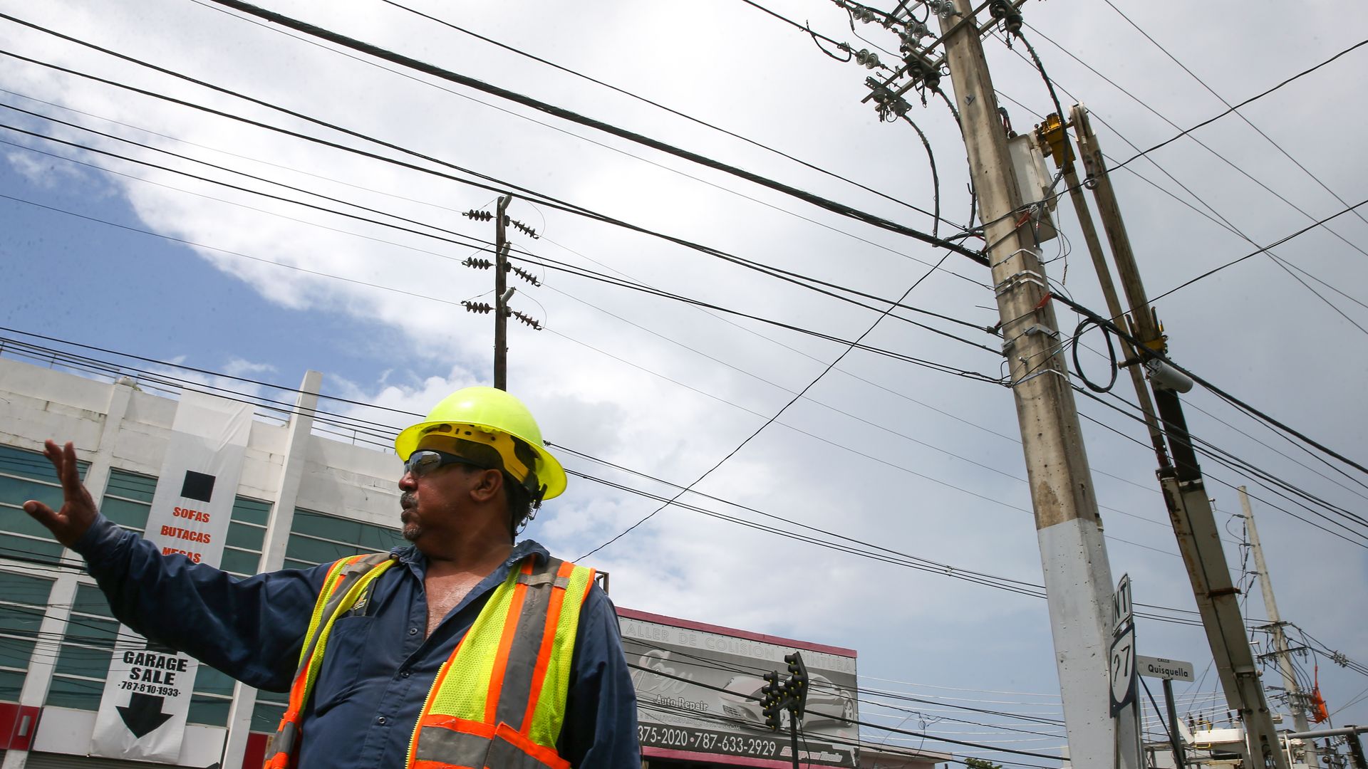 Puerto Rico's workers working on power lines