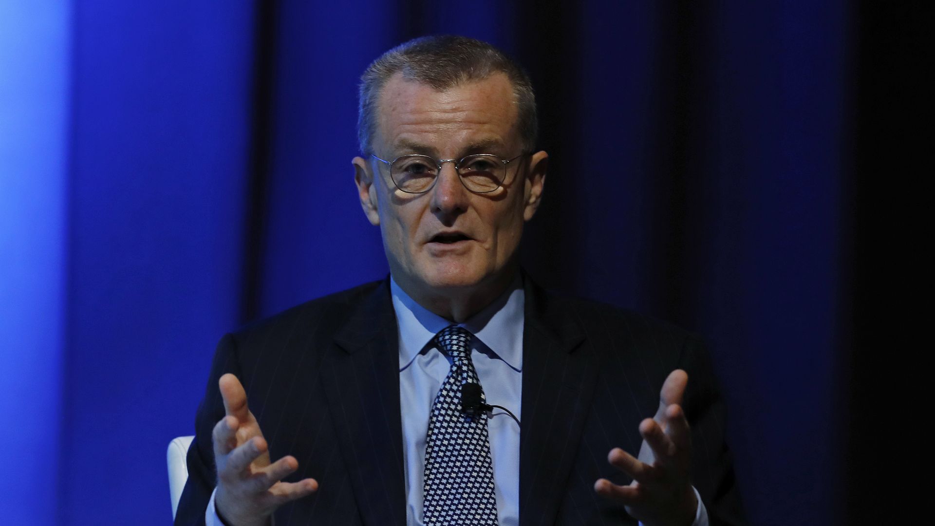 Bill Magness speaks with his hands in front of him