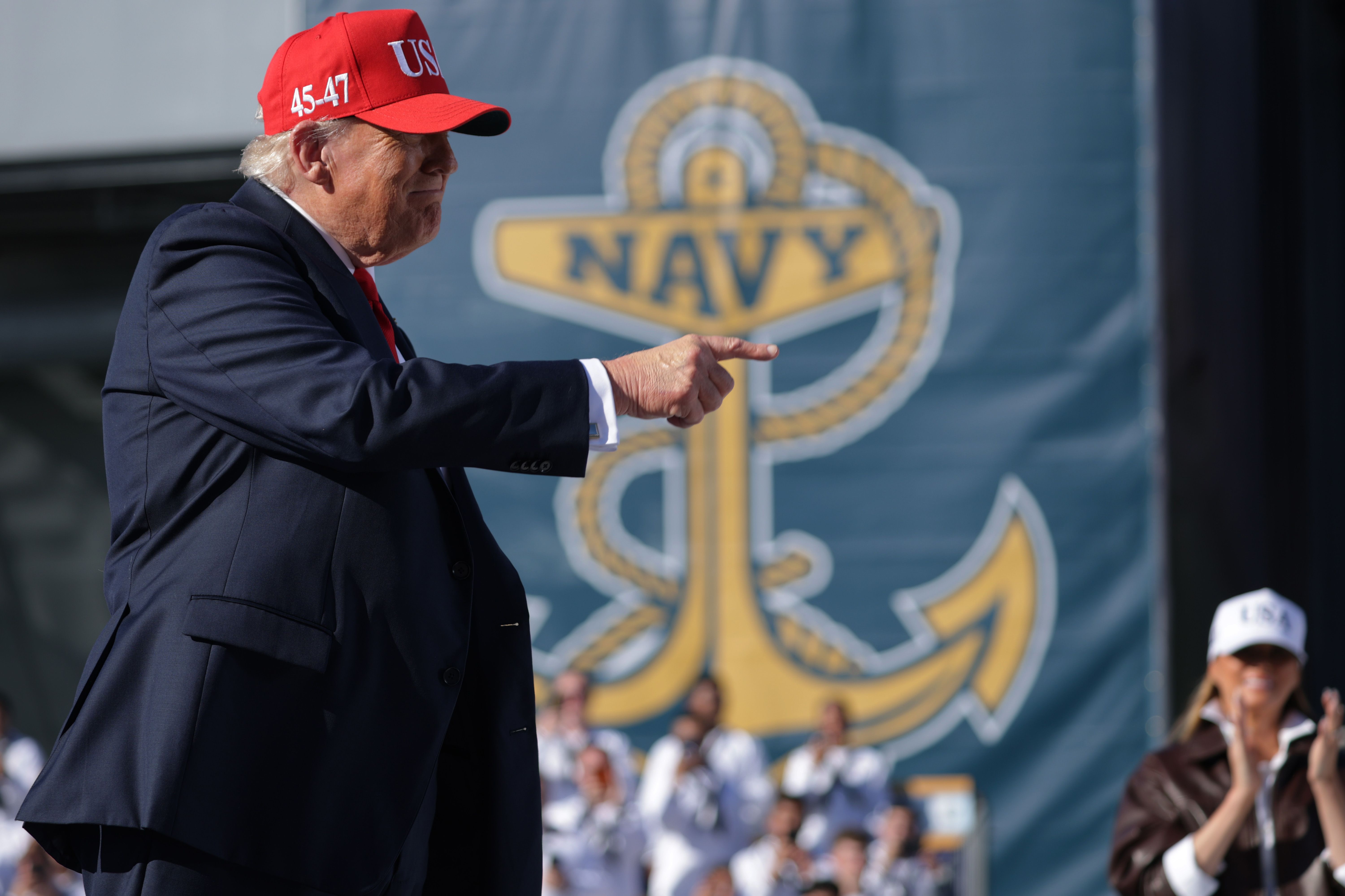 President Trump takes the stage before speaking at a celebration for the U.S. Navy's 250th anniversary in October.