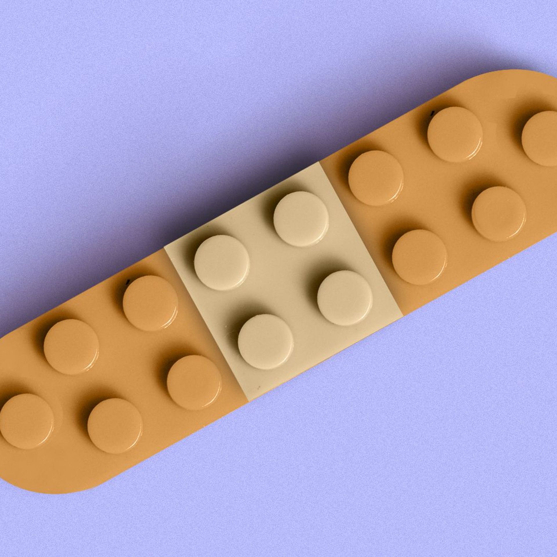 Illustration of a bandaid made out of lego blocks.