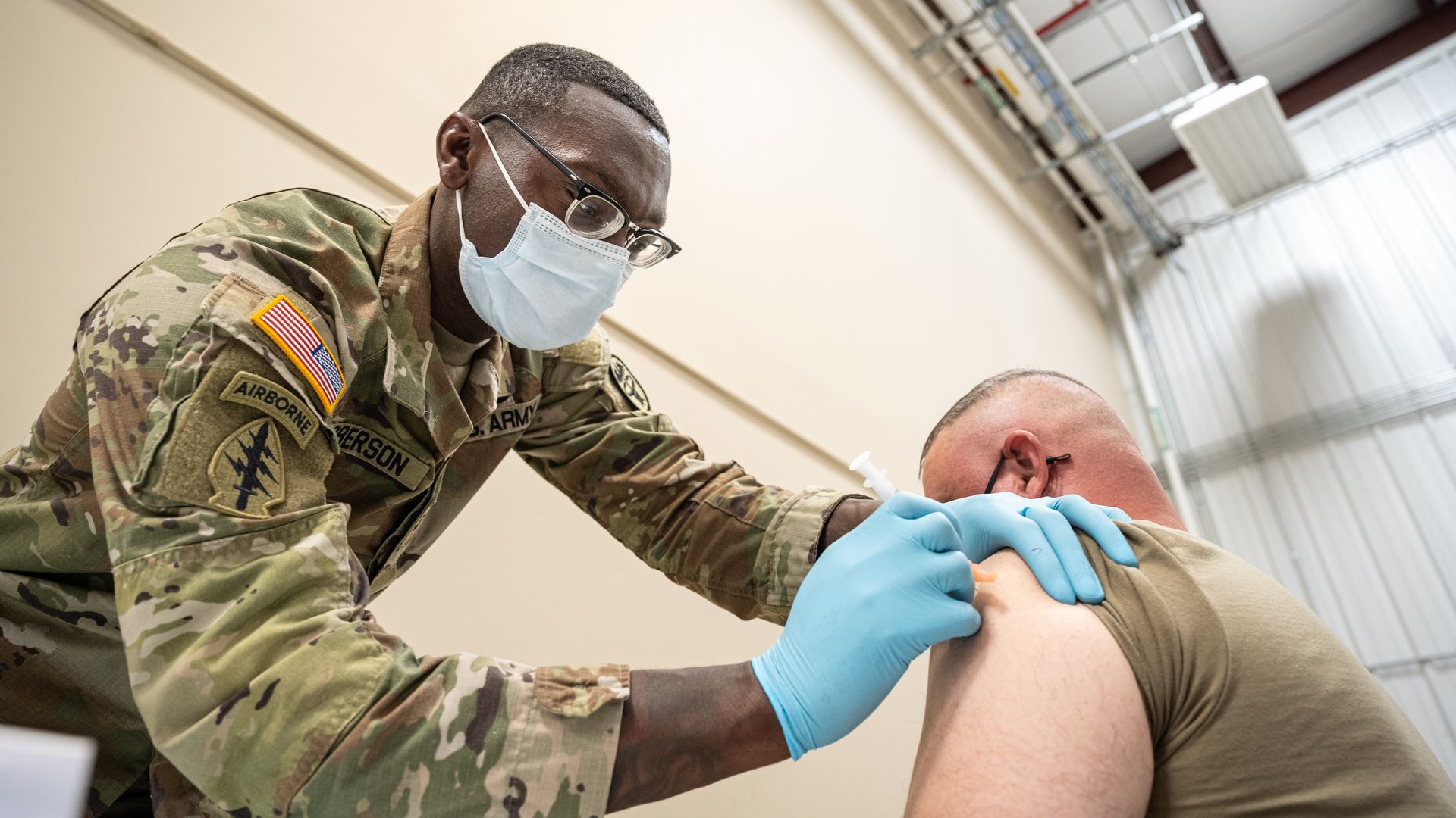 A U.S. soldier administering a coronavirus vaccine in Fort Knox, Kentucky, in September 2021.