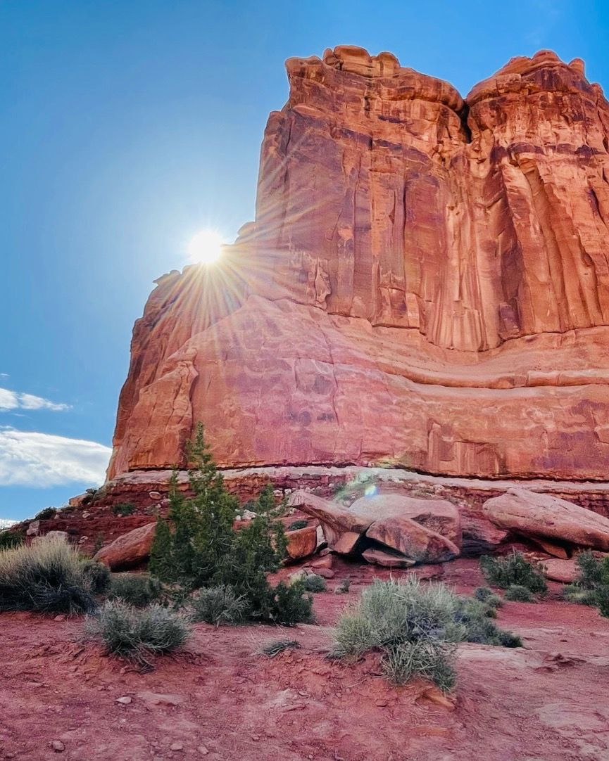 Sun through red rocks