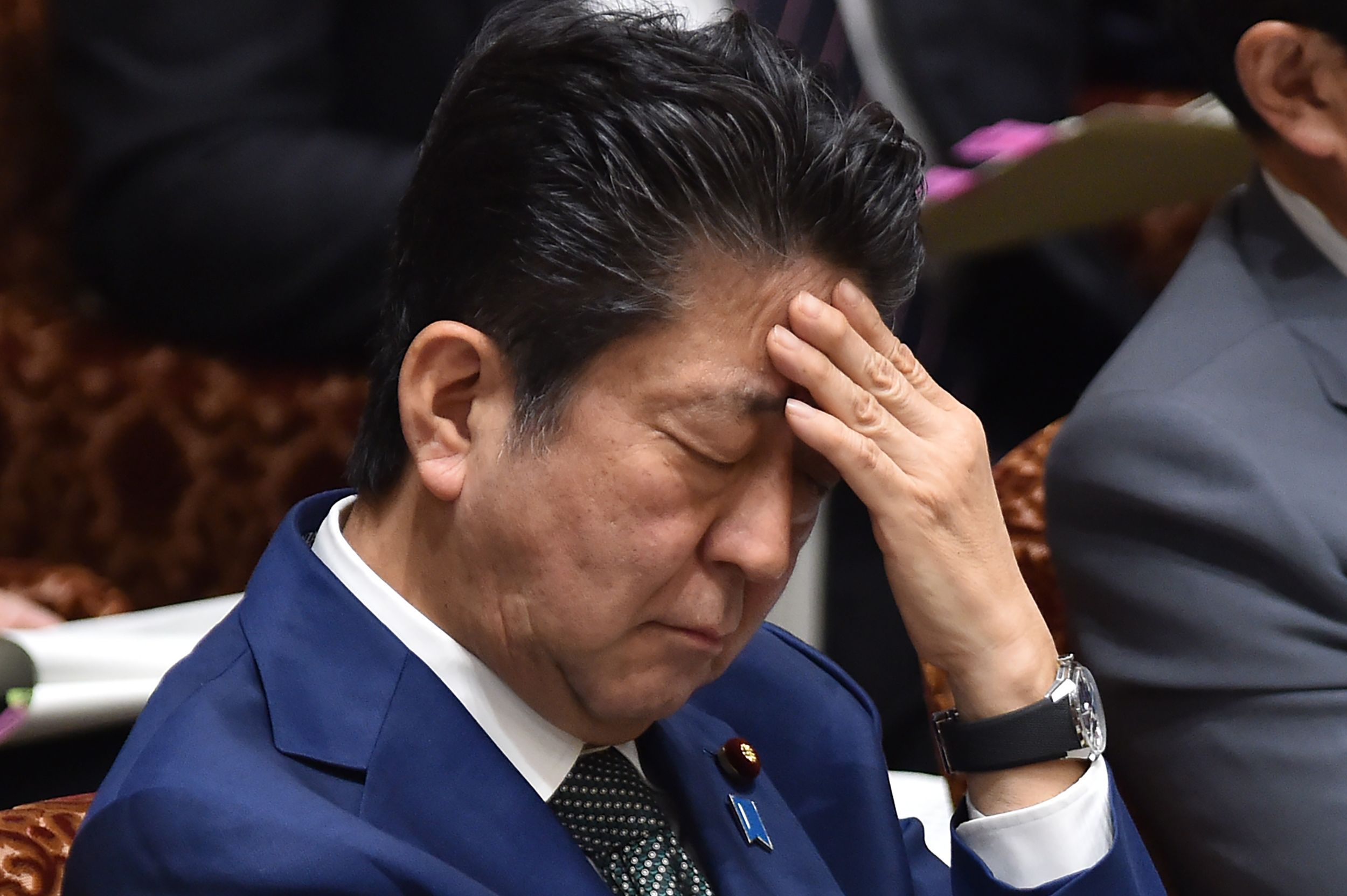 Shinzo Abe grimacing