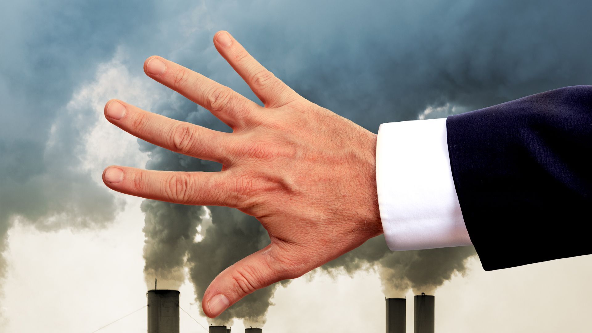 Illustration of a hand in a suit covering up an image of smoke emerging from a power plant