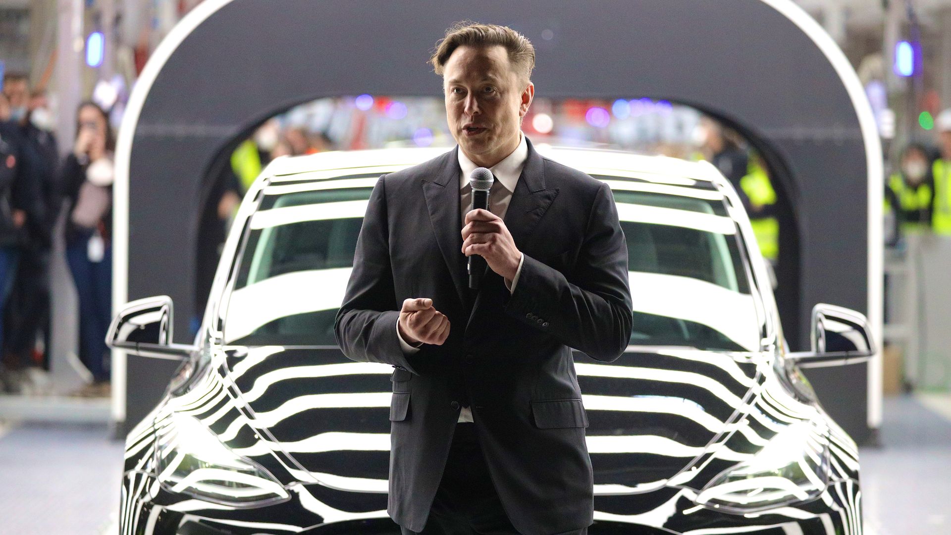 Tesla CEO Elon Musk speaks during the official opening of the new Tesla electric car manufacturing plant on March 22, 2022 near Gruenheide, Germany. 