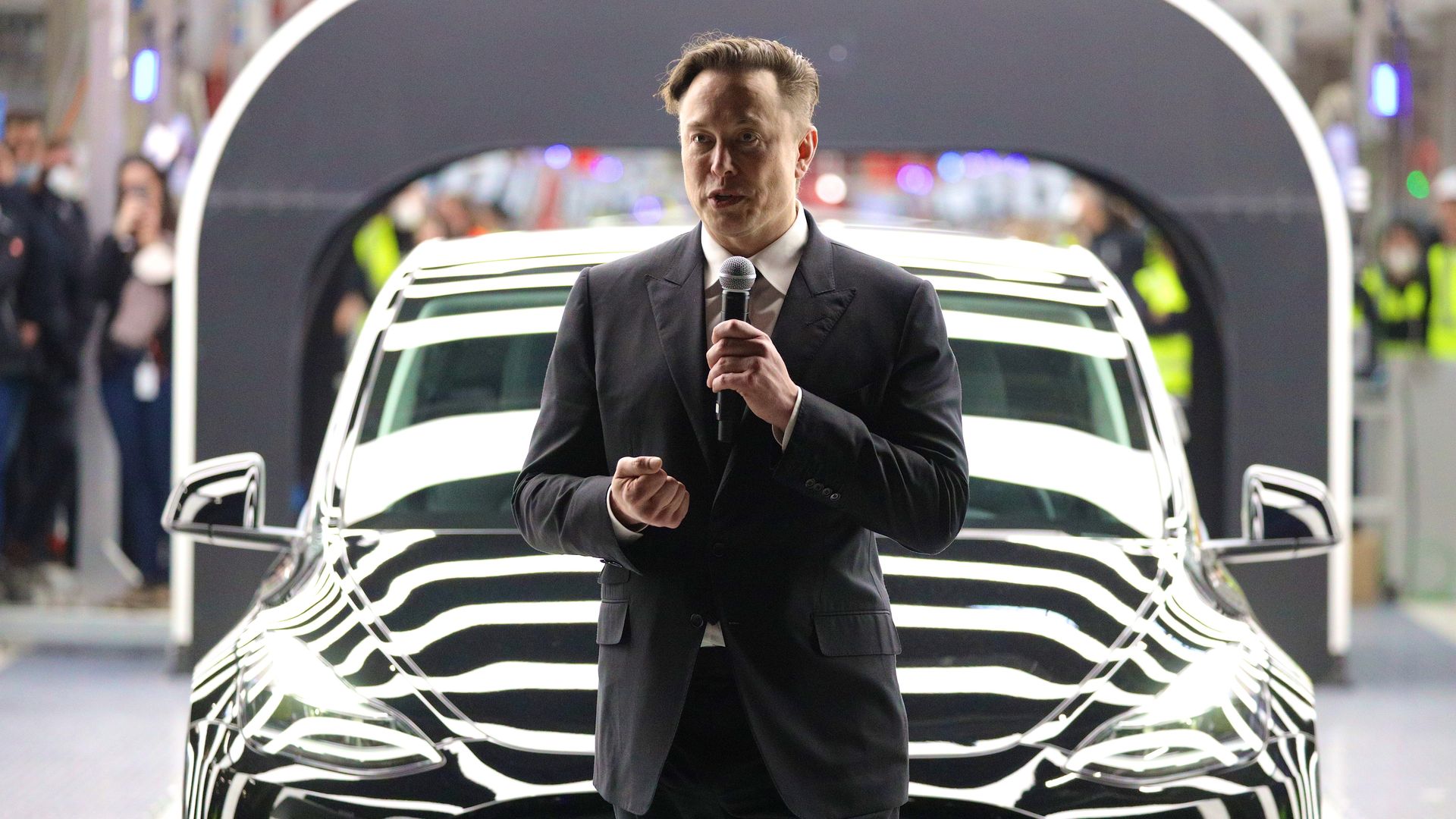 Tesla CEO Elon Musk speaks during the official opening of the new Tesla electric car manufacturing plant on March 22, 2022 near Gruenheide, Germany.