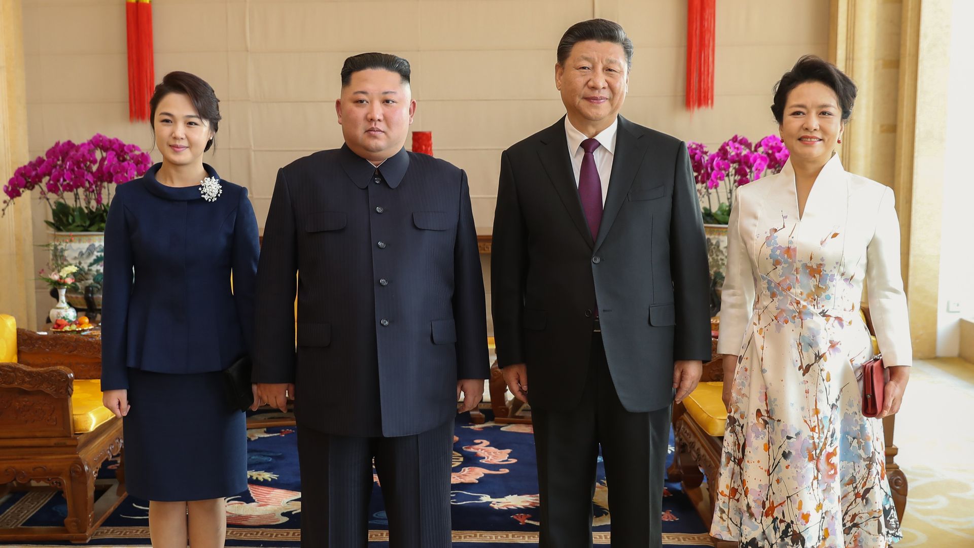 China President Xi Jinping and North korean Leder Kim Jong Un in China with their wives. Photo: Xinhua/Huang Jingwen via Getty Images