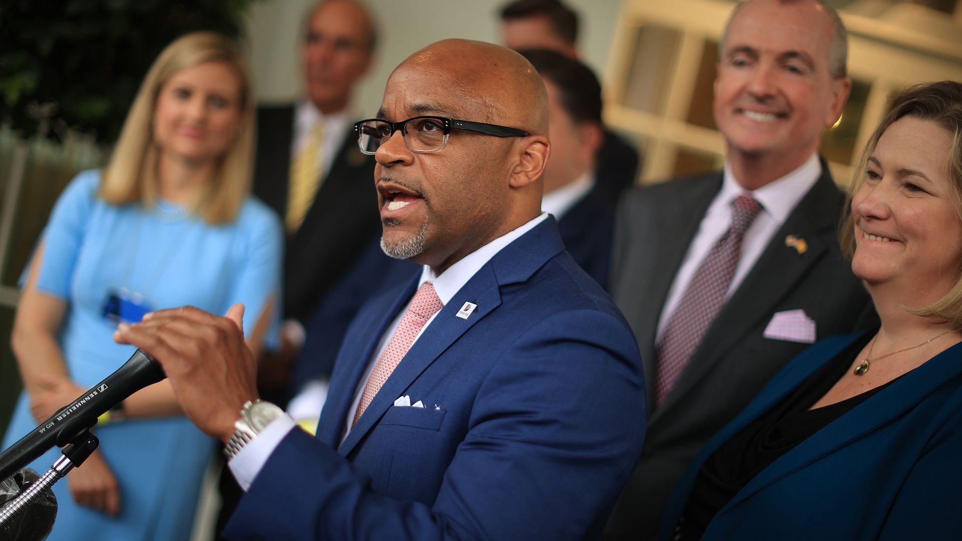 A photo of Hancock talking during a press conference