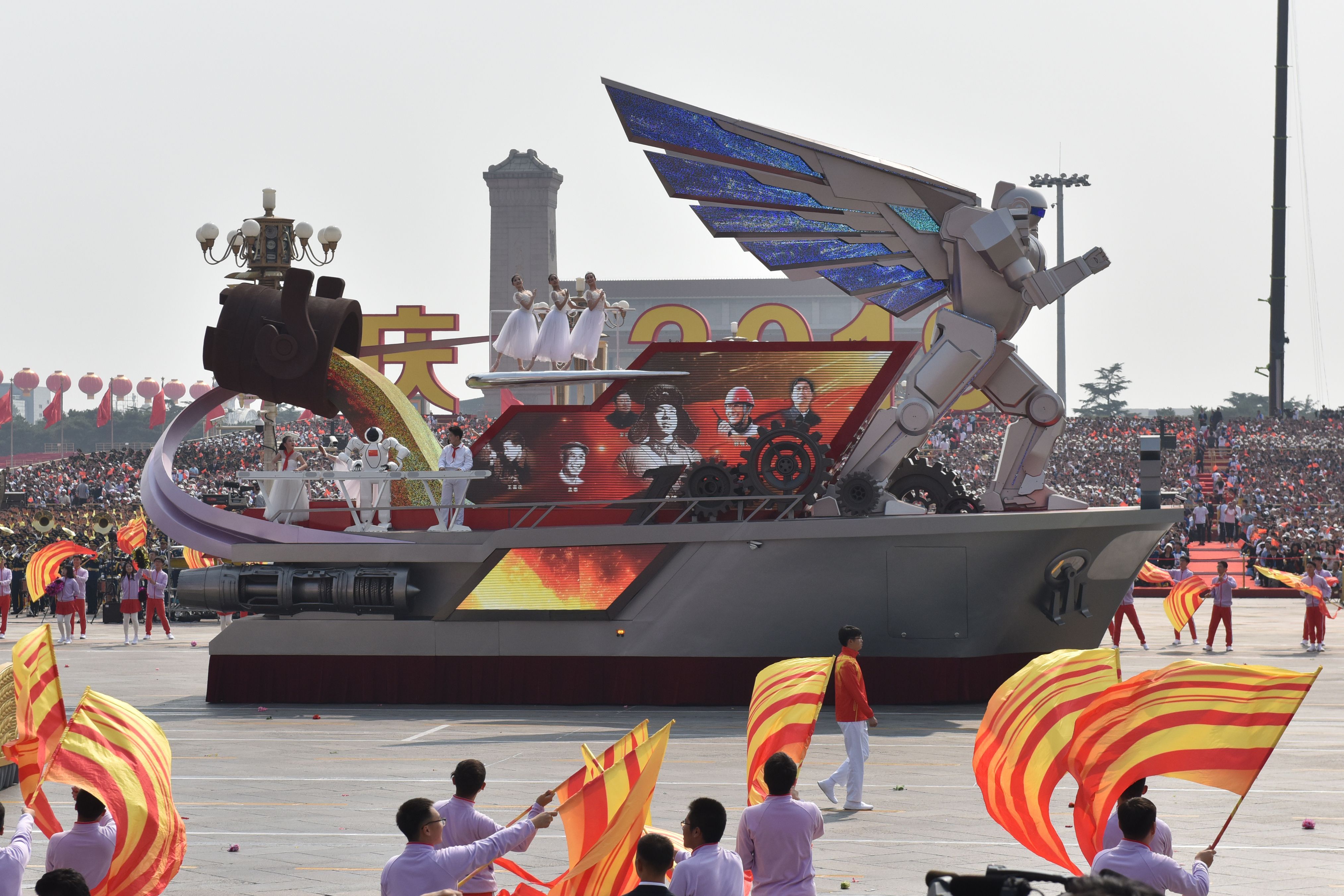 The Liaoning Province float featuring a giant winged robot passes through Tiananmen Square during a military parade in Beijing on October 1