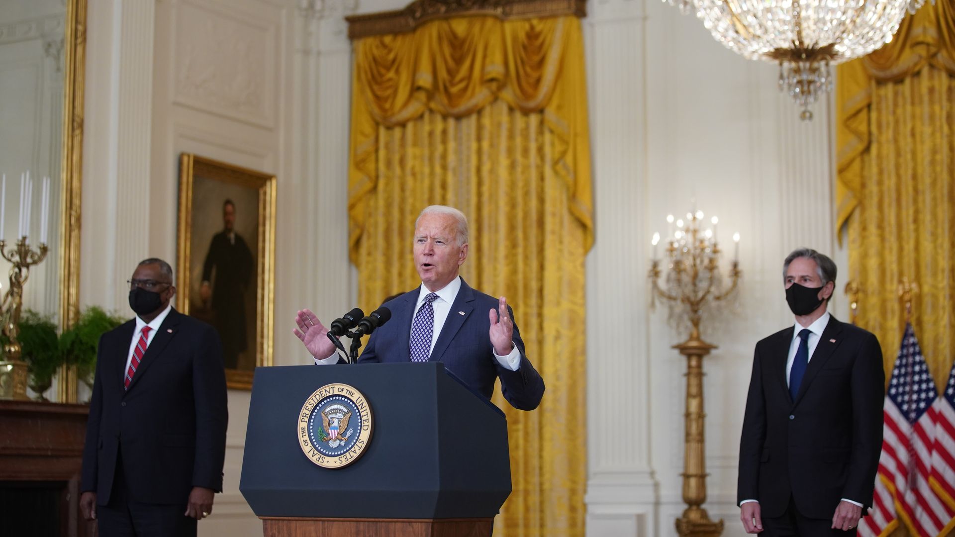 Lloyd Austin and Tony Blinken pictured with President Biden