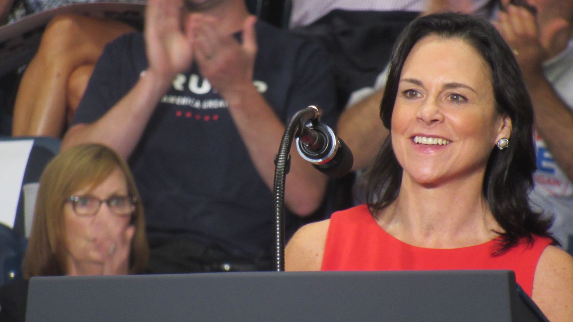 Jane Timken is seen speaking at a rally for President Trump.