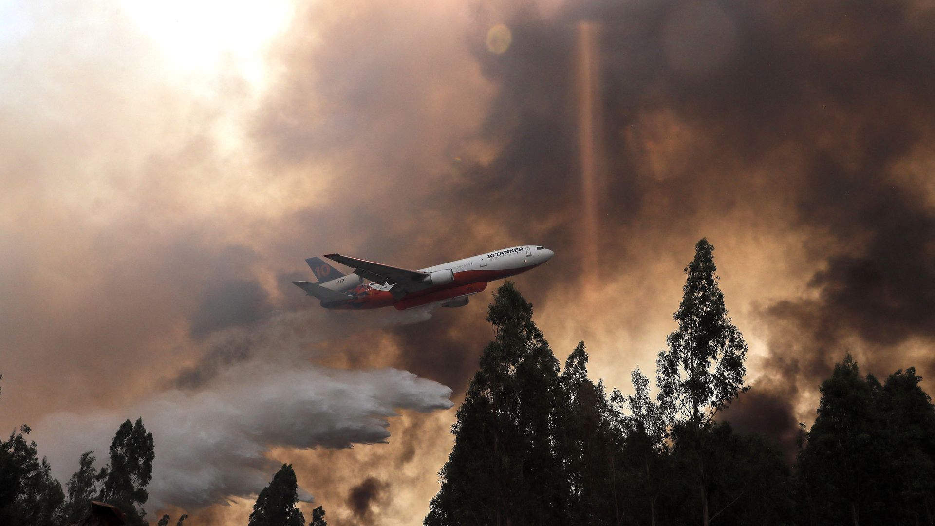 A 10 Tanker DC-10 fire plane combats a forest fire in Ninhue, Ñuble Region, in Chile, on February 10, 2023. 