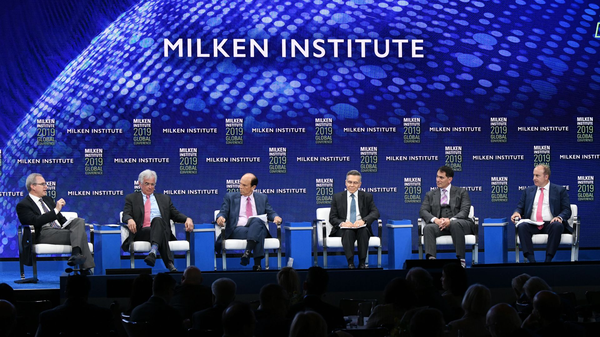 A panel at the Milken conference in 2019
