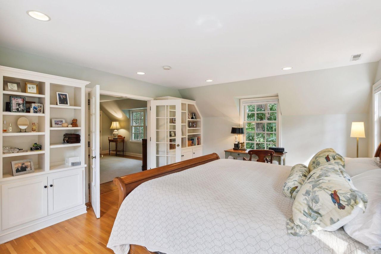 bedroom with build in shelving