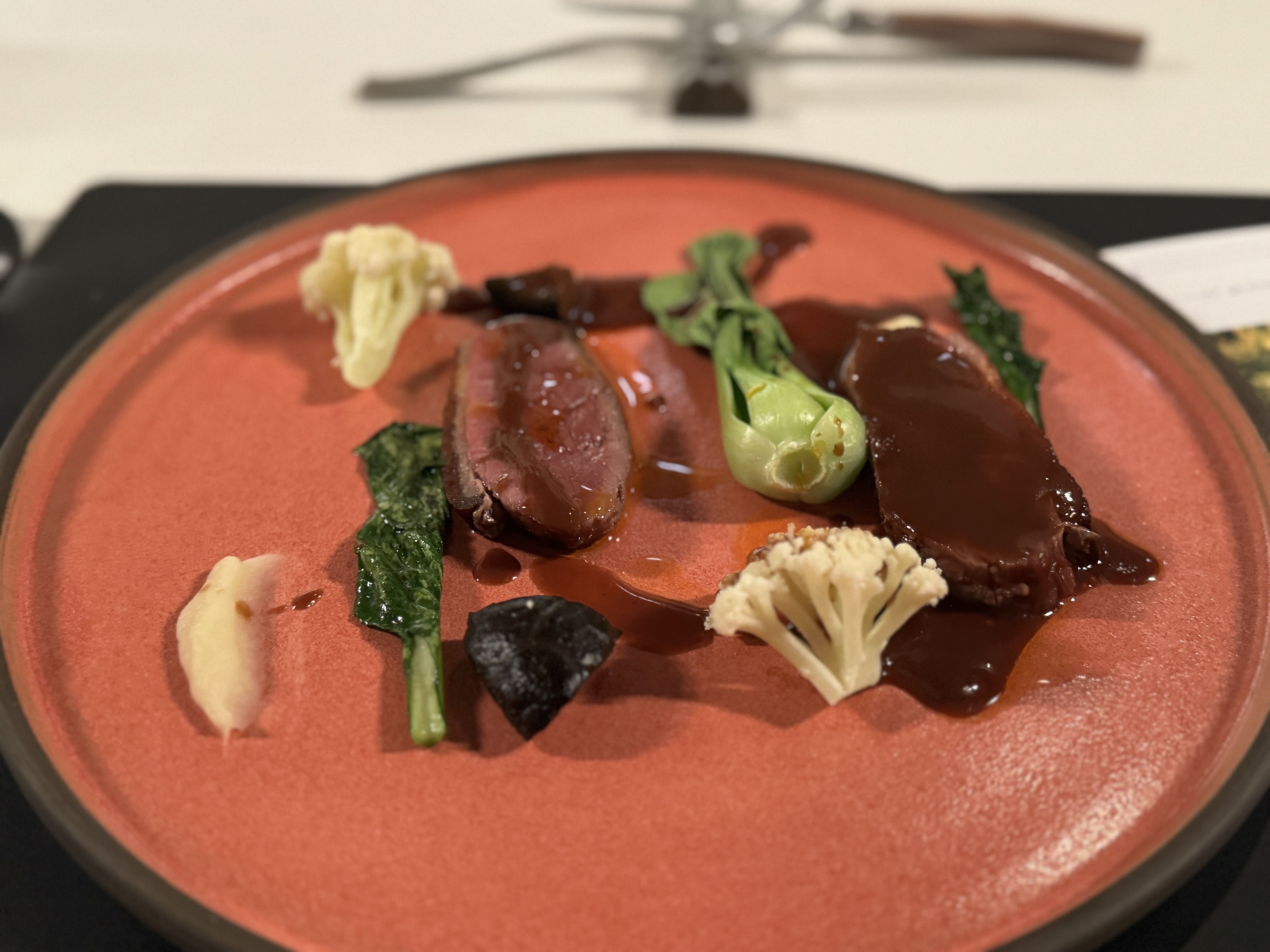 different vegetables arranged in a line on a plate