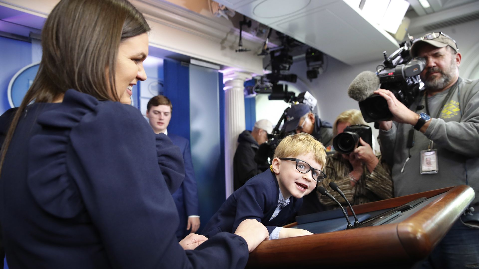 Sanders' son Huck, 4, climbed the podium during a press preview of the Thanksgiving turkey pardoning.