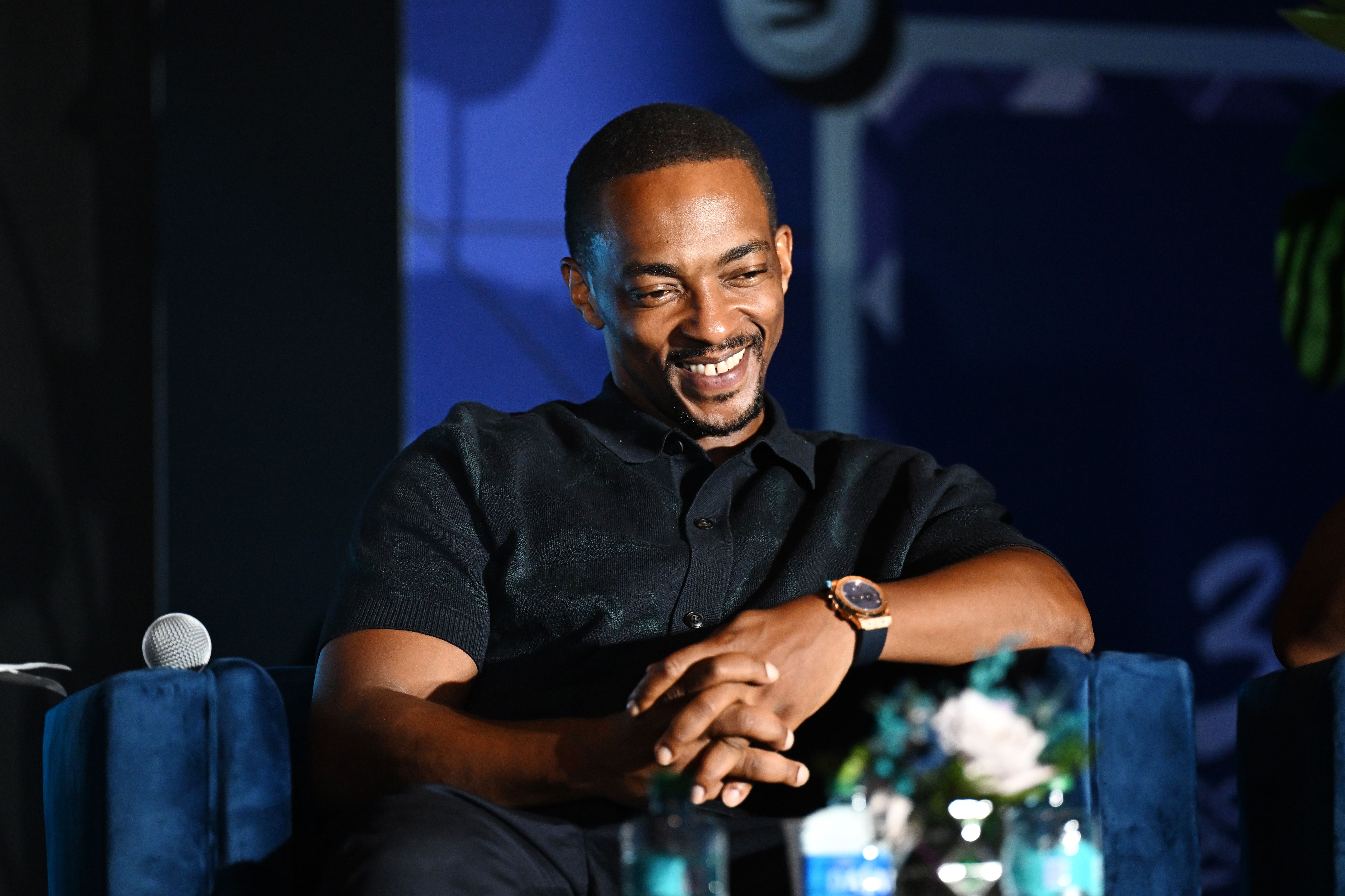 Anthony Mackie smiles during Essence.