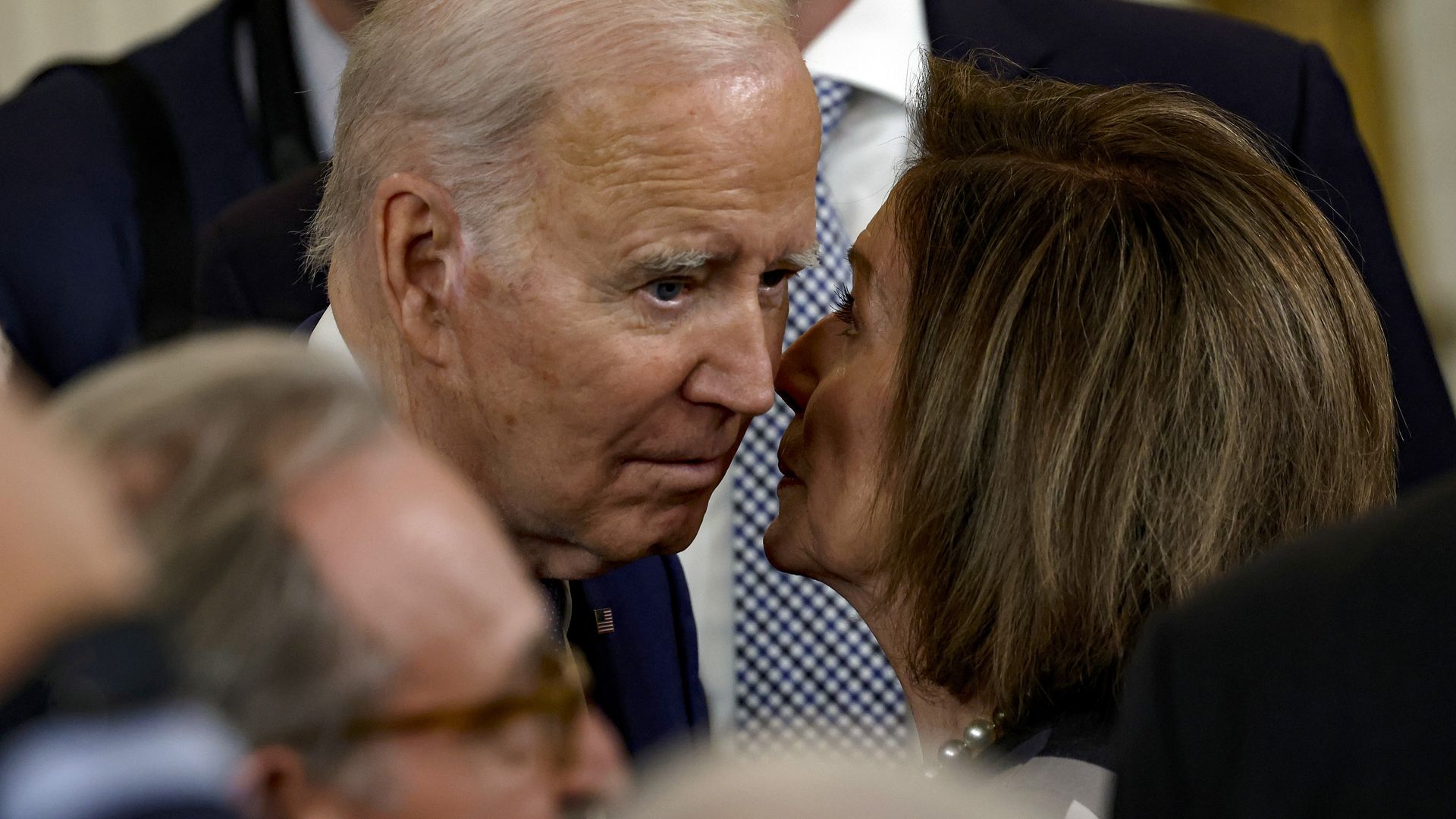 Whispering in his ear