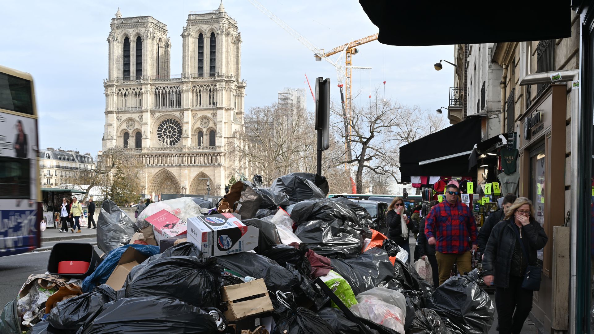 Garbage cans overflowing with trash on the streets as collectors go on strike in Paris