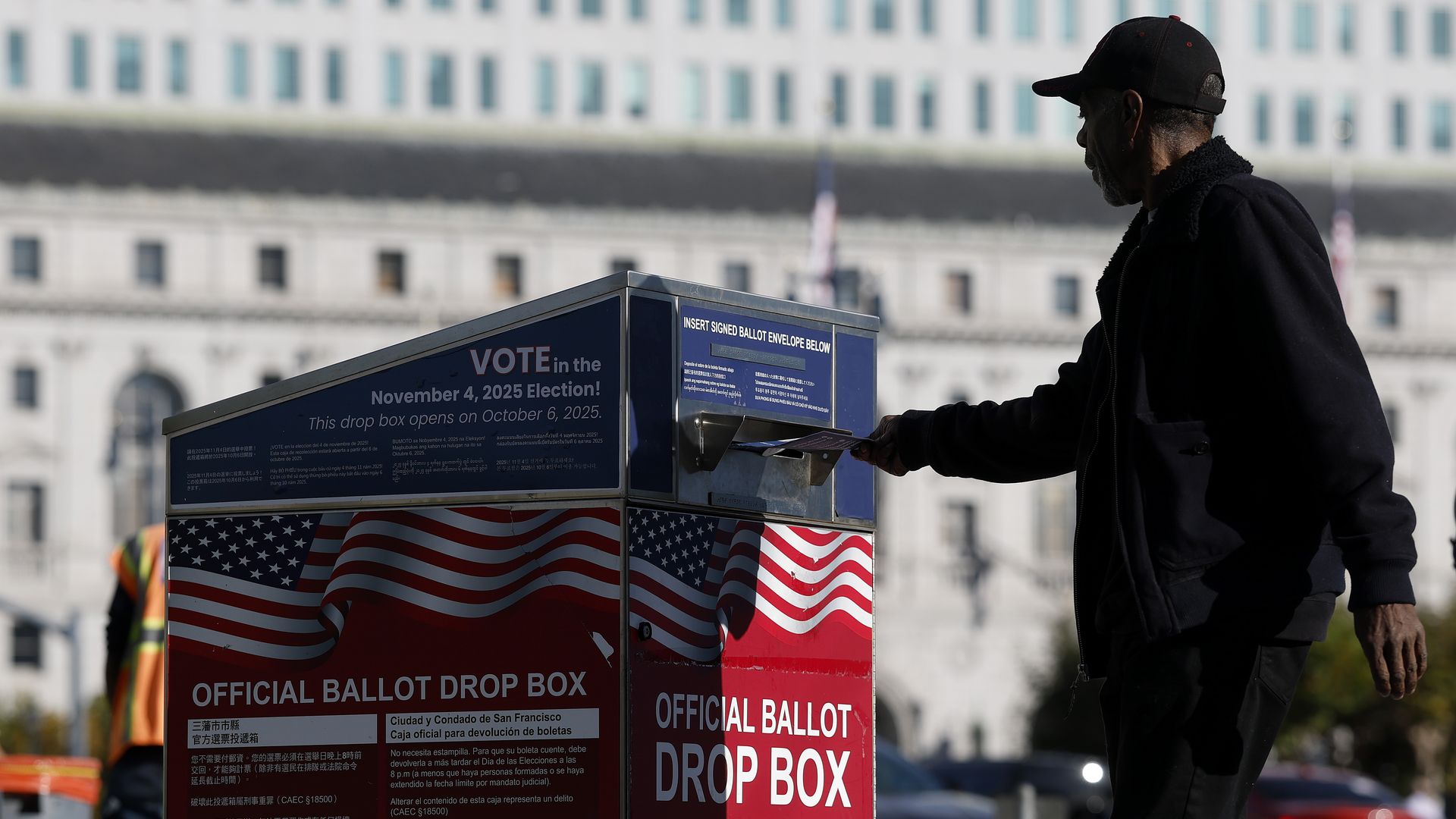 A voter drops his ballot in a drop box outside of San Francisco City Hall on November 04, 2025 in San Francisco, California. 