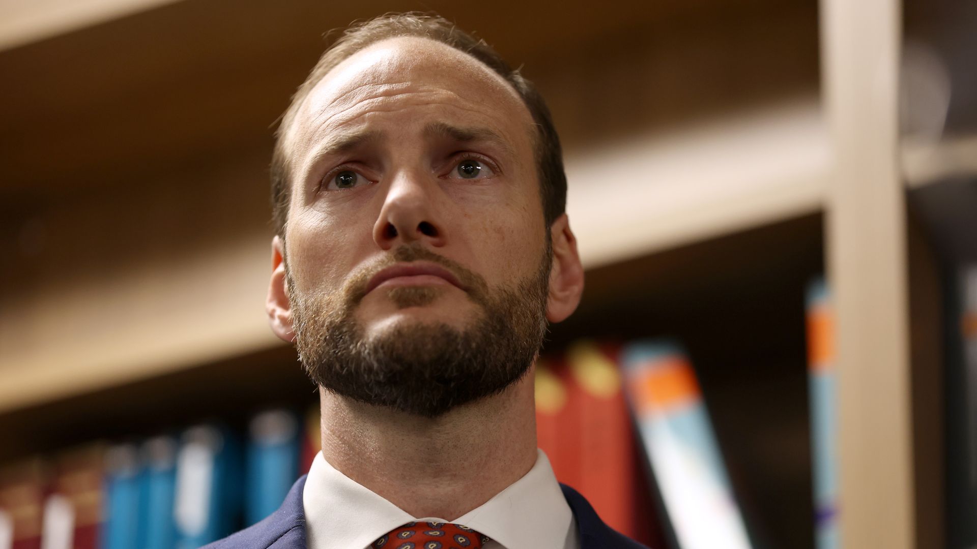 San Francisco District Attorney Chesa Boudin looks on during a news conference on May 10, 2022.