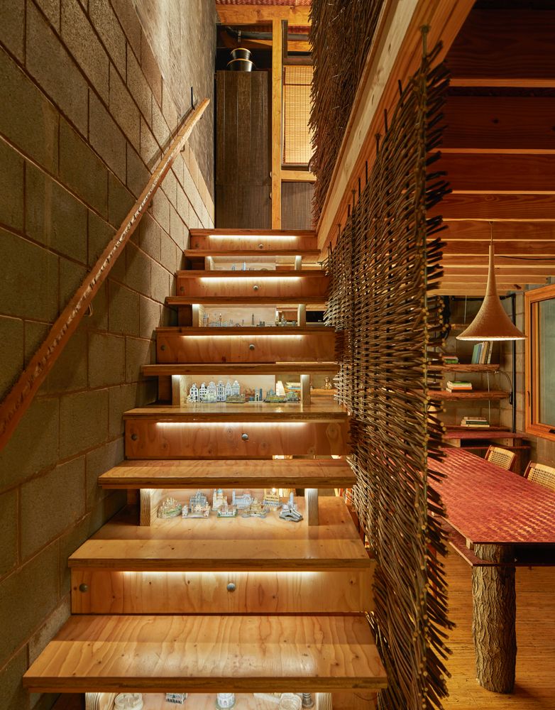 A staircase inside the Grass House.