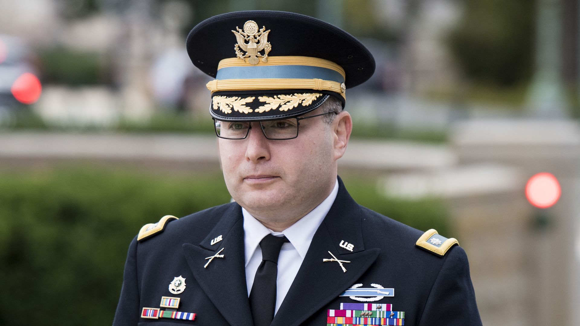 This is an image of Lt. Col. Alexander Vindman in his navy blue military uniform and cap