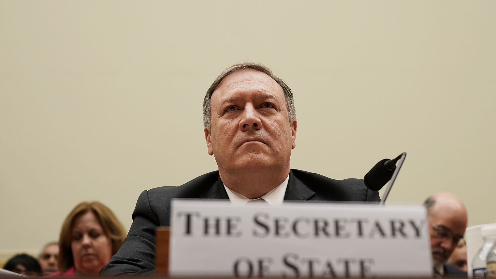 Mike Pompeo with a name plaque in front of him which reads "The Secretary of State"