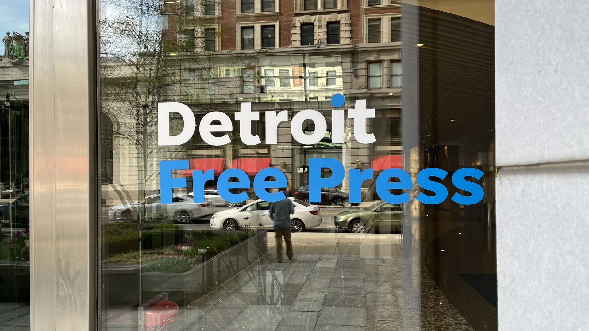 The Detroit Free Press logo emblazoned on a window.