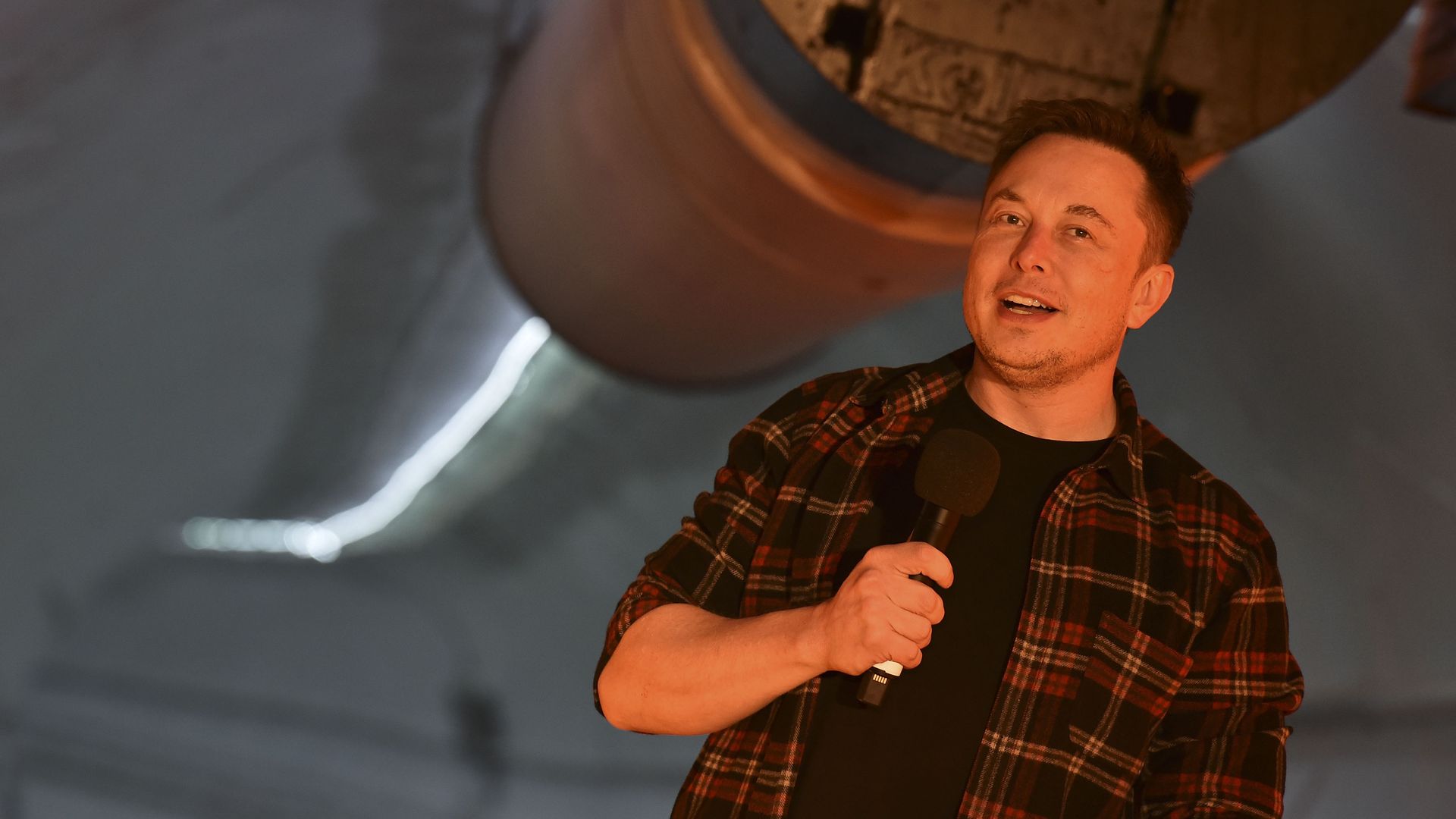 Elon Musk, co-founder and Chief Executive Officer of Tesla Inc., speaks at an unveiling event for The Boring Company Hawthorne test tunnel 
