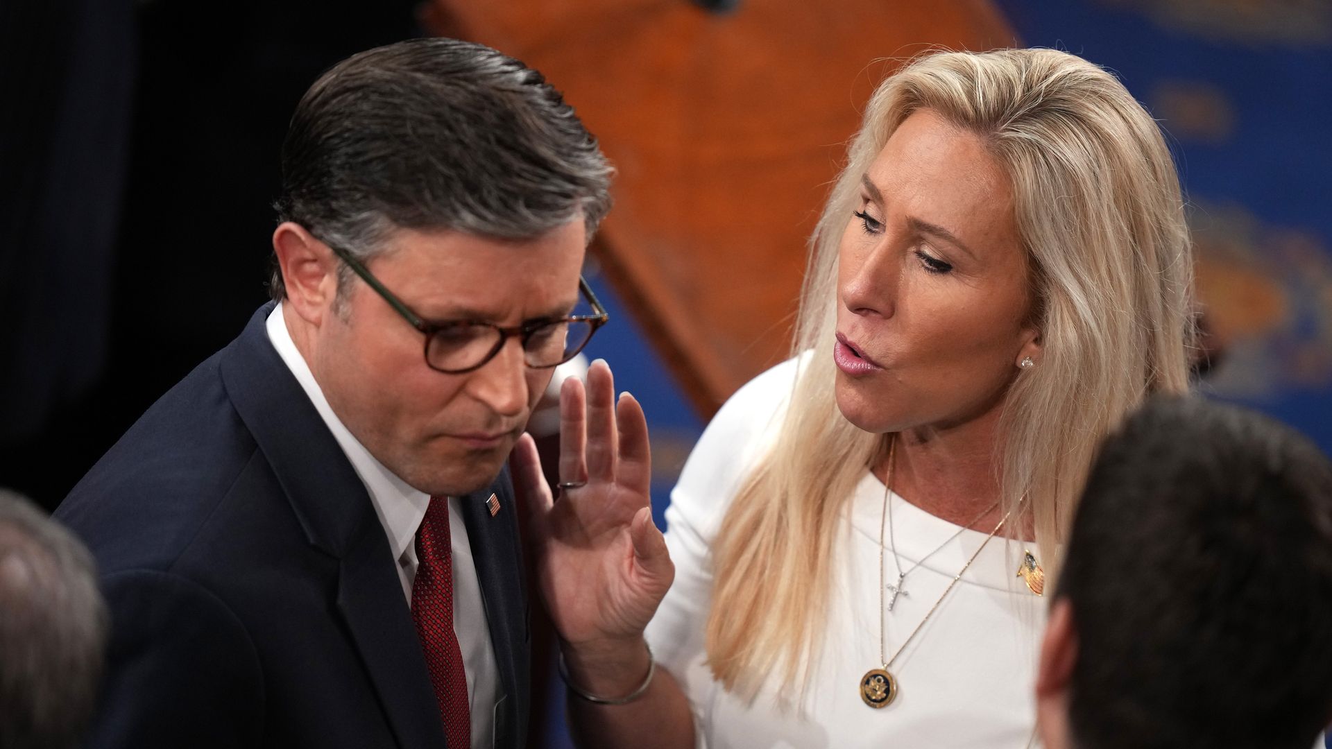 House Speaker Mike Johnson talks to Rep. Marjorie Tayler Greene