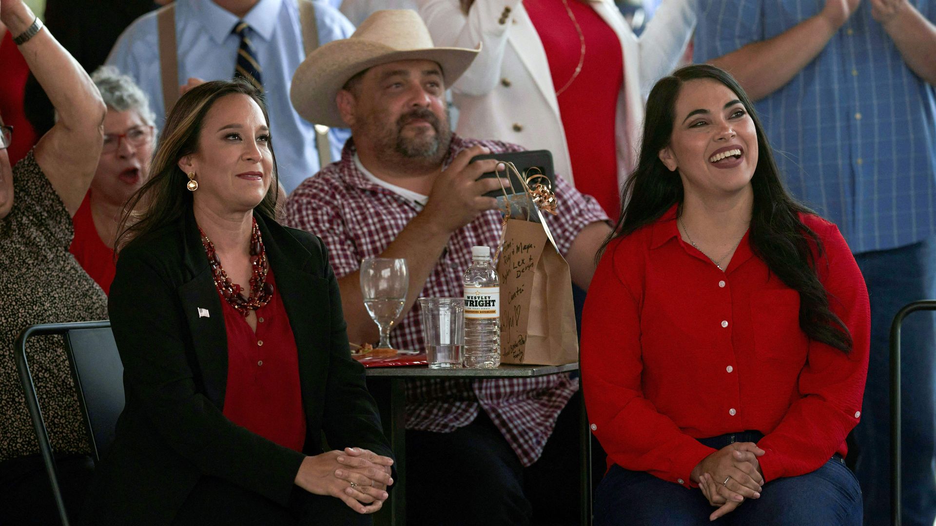 US Republican congressional candidate Monica De La Cruz (L) and Representative Mayra Flores (R) of Texas, who is running for reelection, attend a campaign event