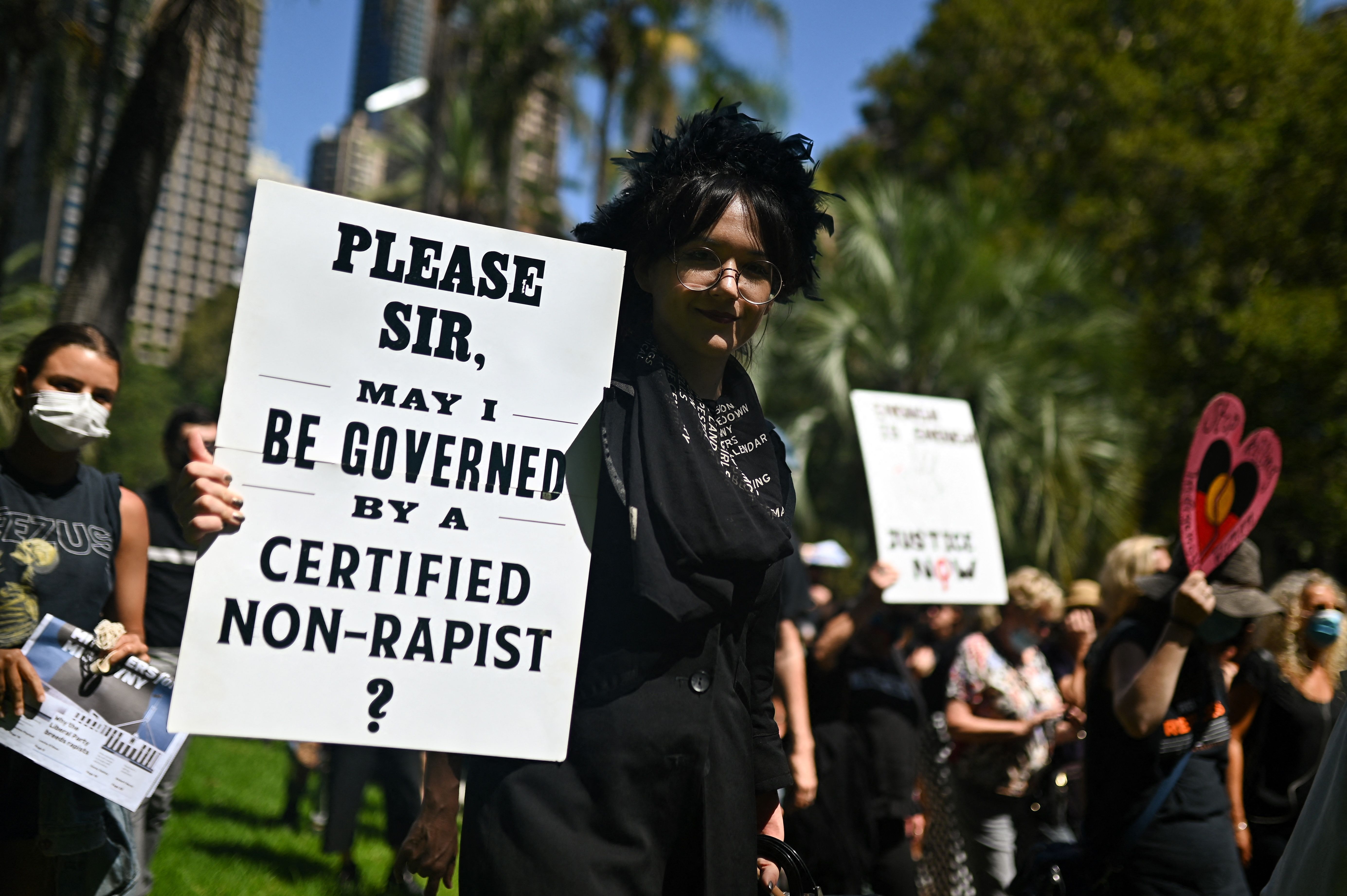 Protesters attend a rally against sexual violence and gender inequality in Sydney on March 15