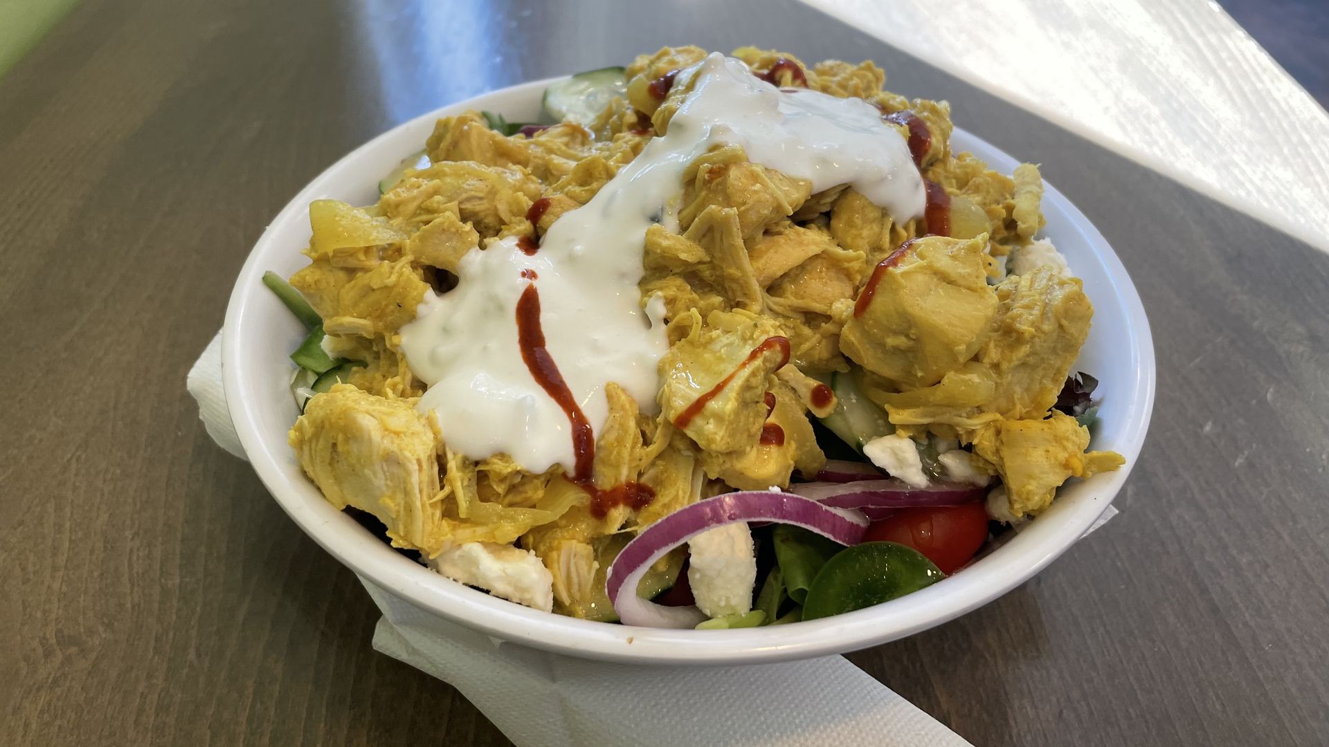 yellow chicken on salad