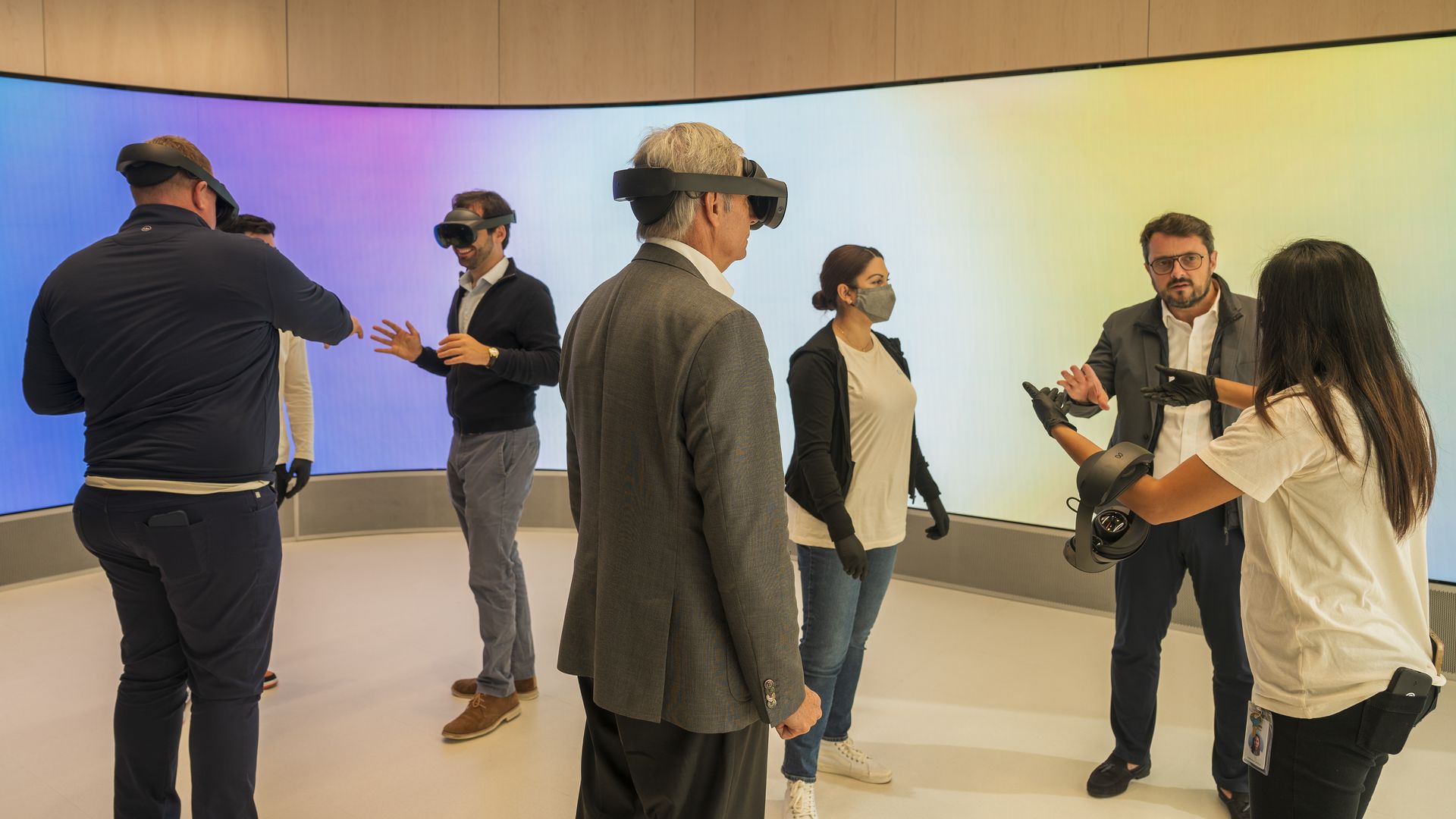 Meta employees demonstrate the Meta Quest Pro virtual reality (VR) headset during a media preview at the Meta Store in Burlingame, California, US, on Tuesday, Oct. 25, 2022.