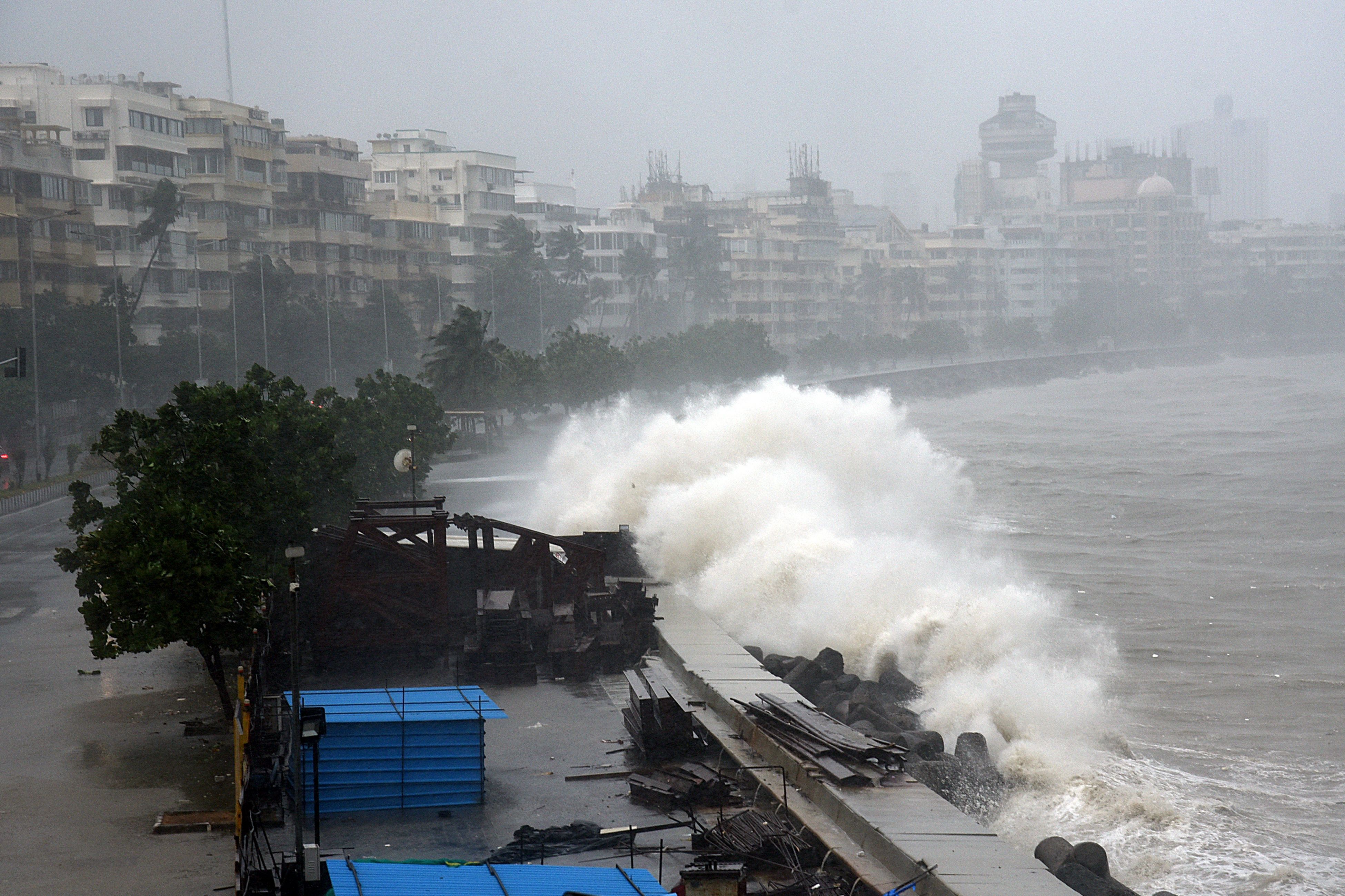 Waves lash over onto a shoreline in Mumbai on May 17, as  Cyclone Tauktae, packing ferocious winds bears down on India. 