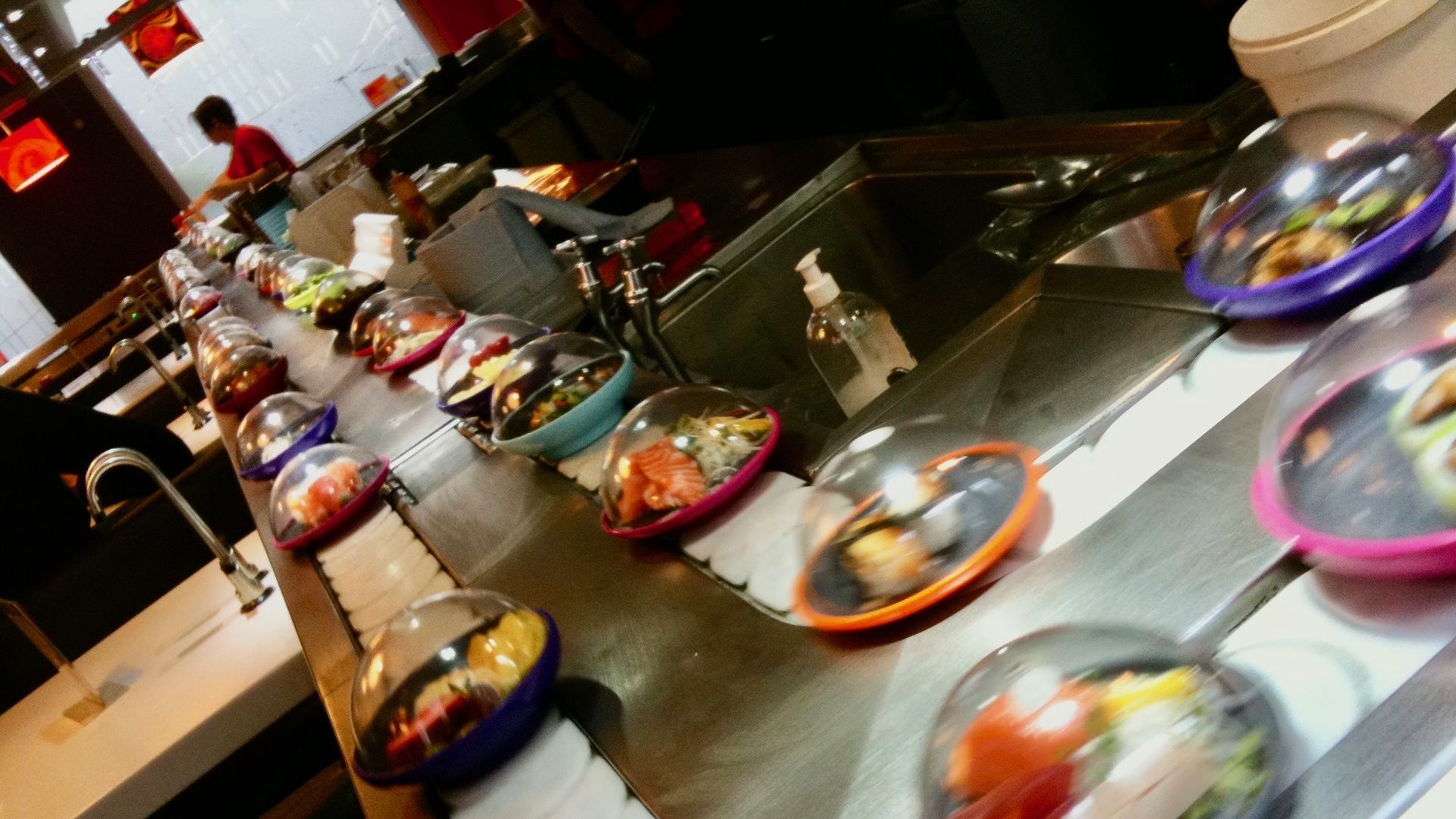 Meals on a conveyor belt at a sushi restaurant in London.
