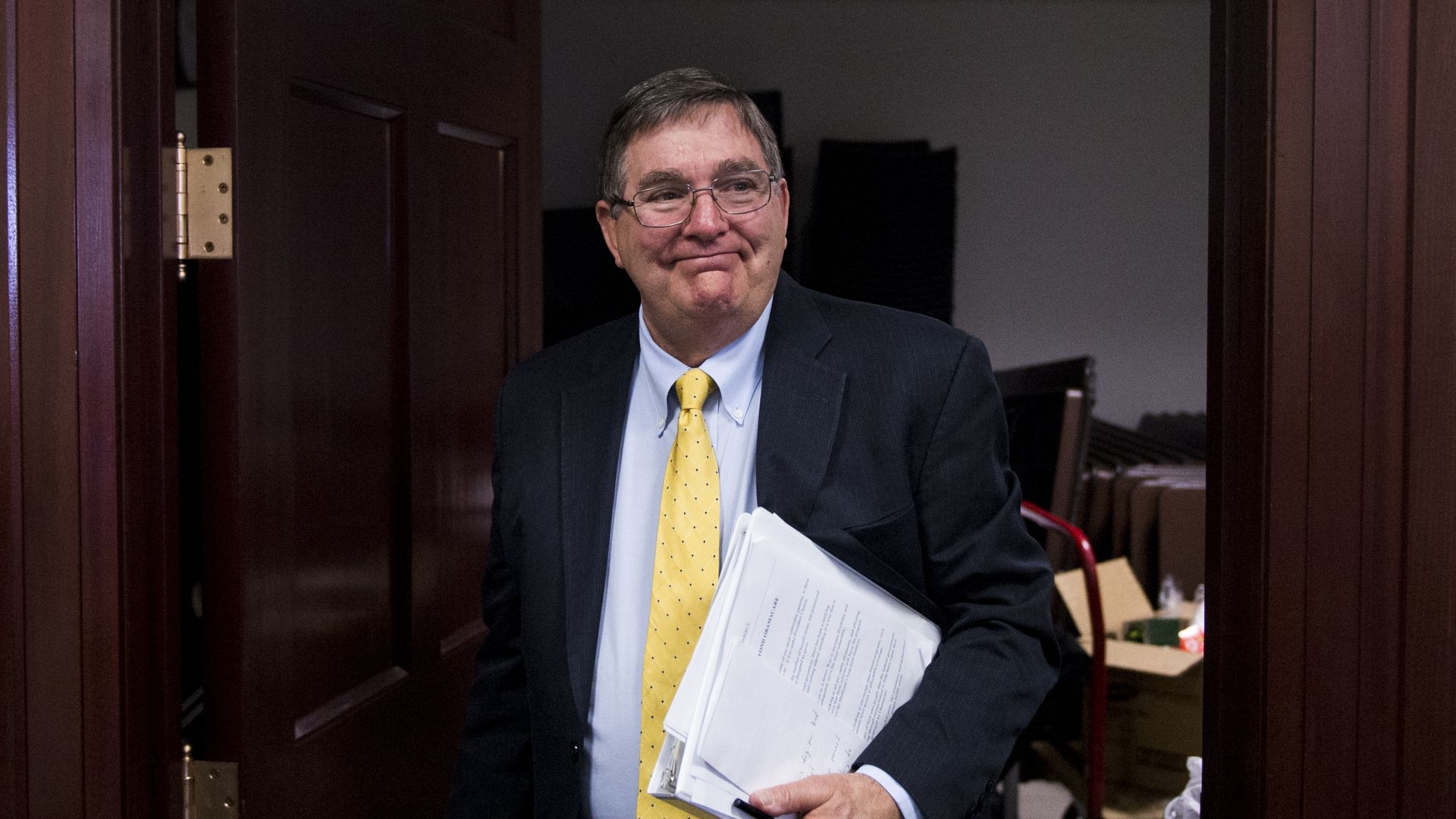 Rep. Michael Burgess leaves the House Republican Conference meeting in the basement of the Capitol. (Photo By Bill Clark/CQ Roll Call)