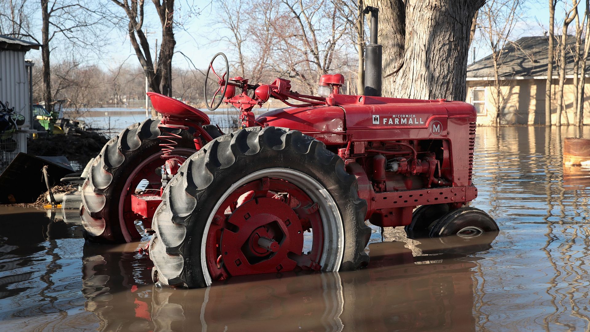Tractor stuck in Iowa flooding