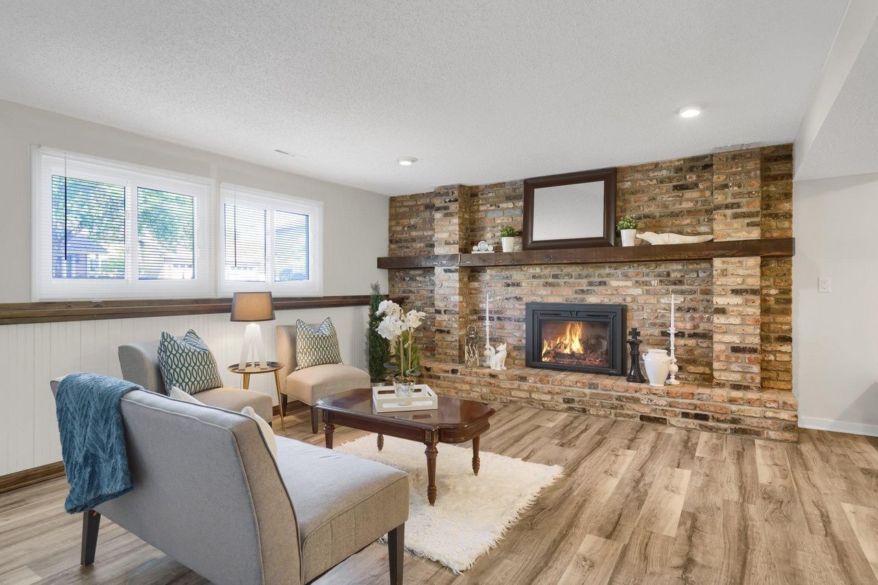 grand fireplace with natural woodwork