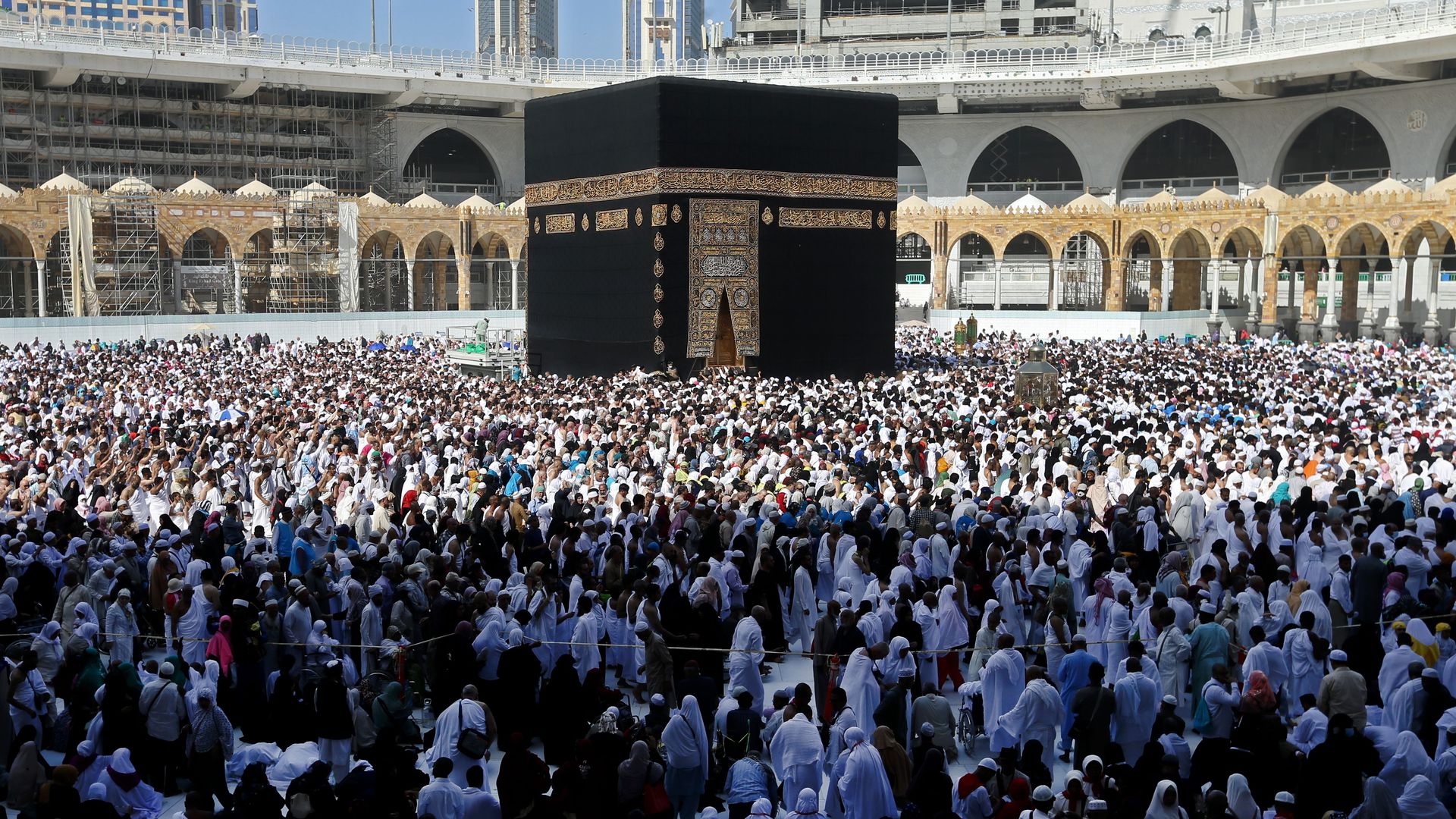 Muslim pilgrims walking around the Kaaba