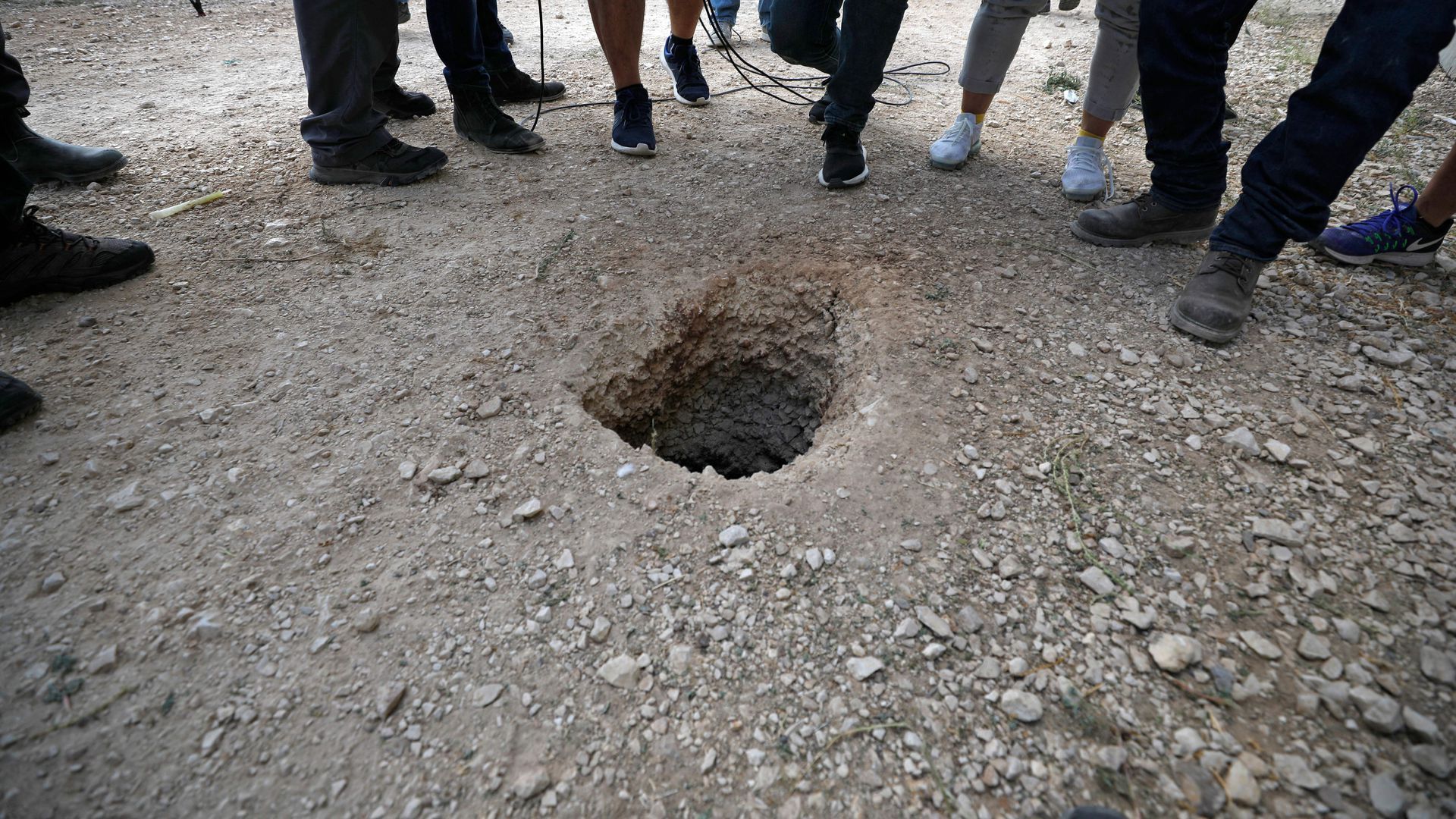 The hole the prisoners escaped from. 